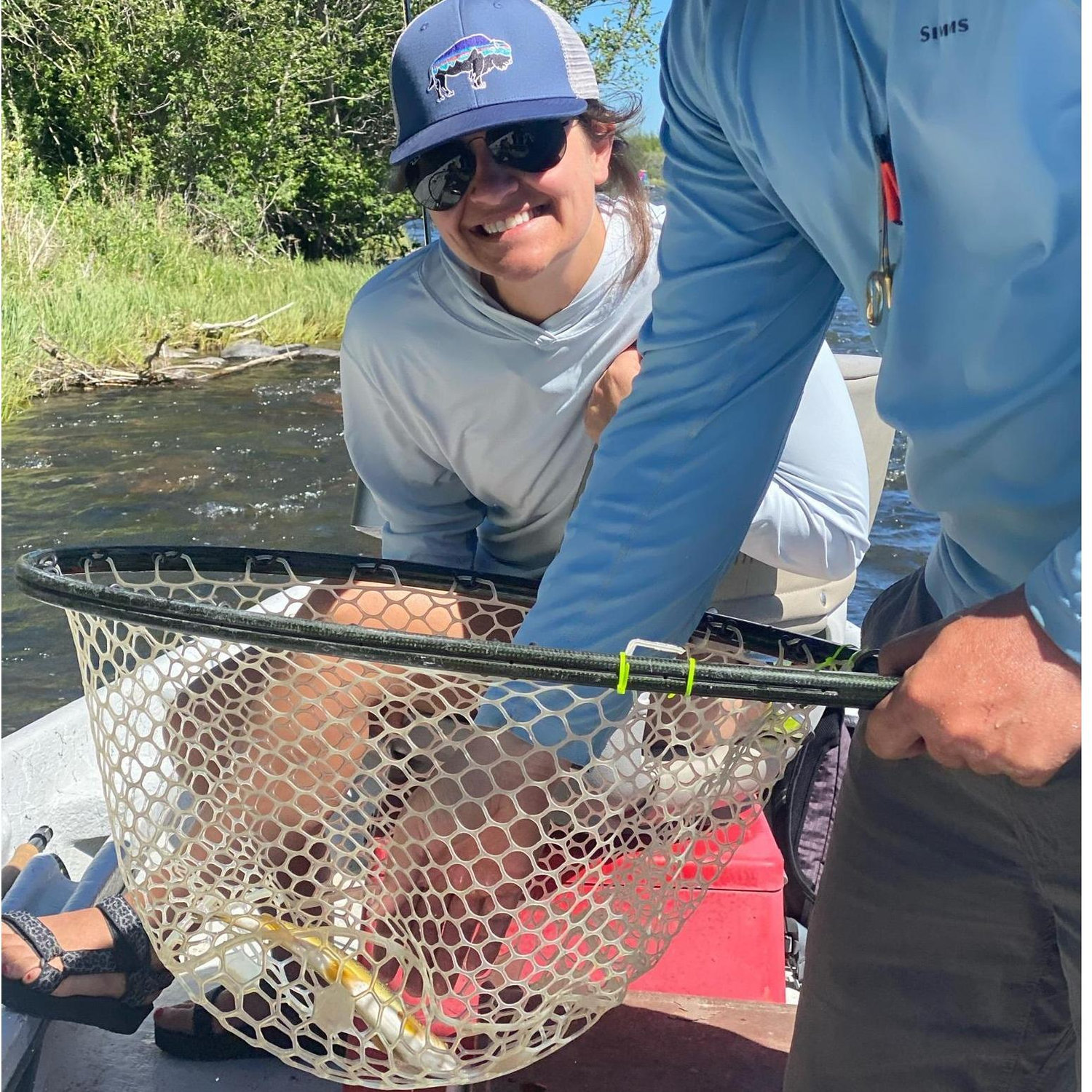 Lara's first trout on a fly rod!