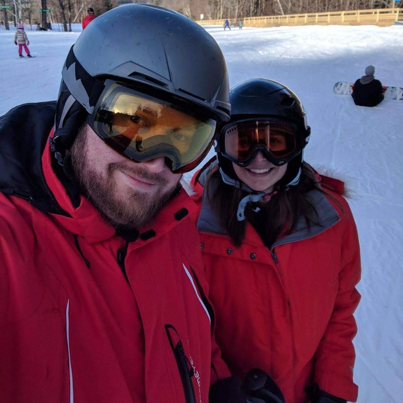 Erich teaching Sarah how to ski