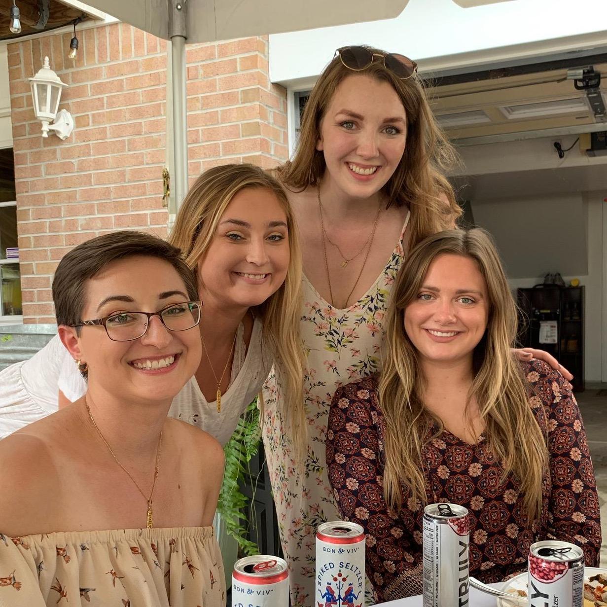 The bride and the bridesmaids (sans the maid of honor) at the engagement party