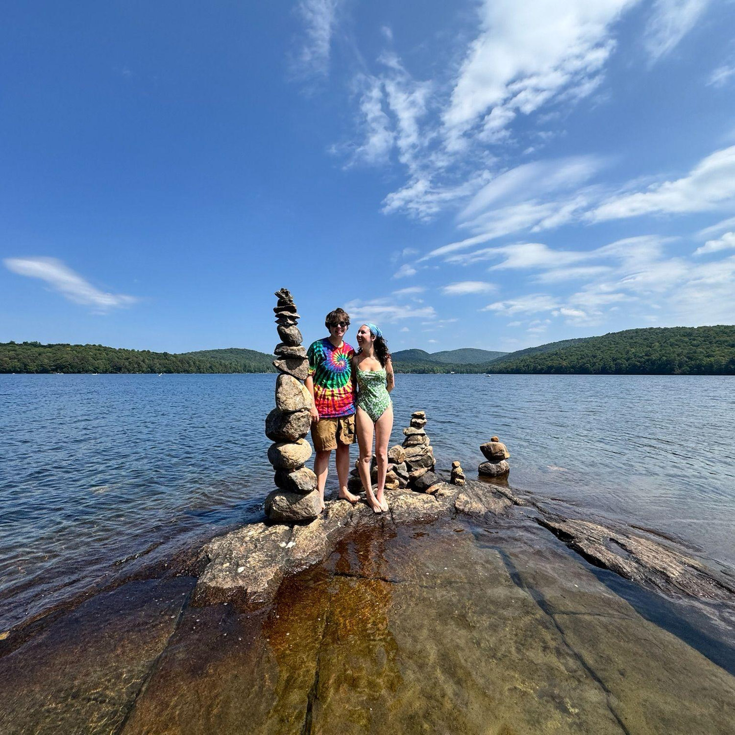 Mia and I went kayaking with my parents and her mom on Limekiln Lake. When we got to the middle of the lake, Mia and I went to one of the islands where I proposed and she proposed back.