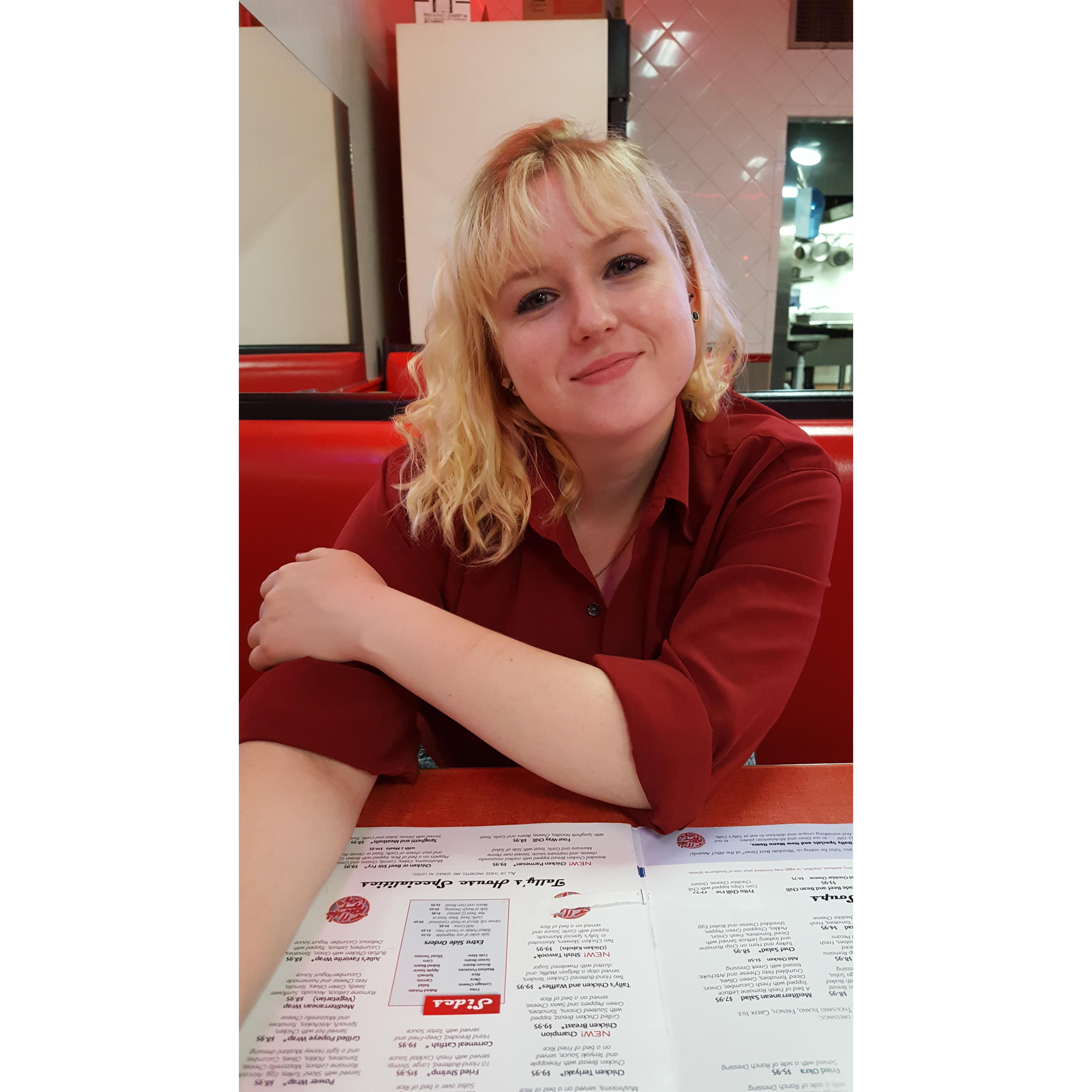 At Talley's, waiting for our food... She looks good in red!