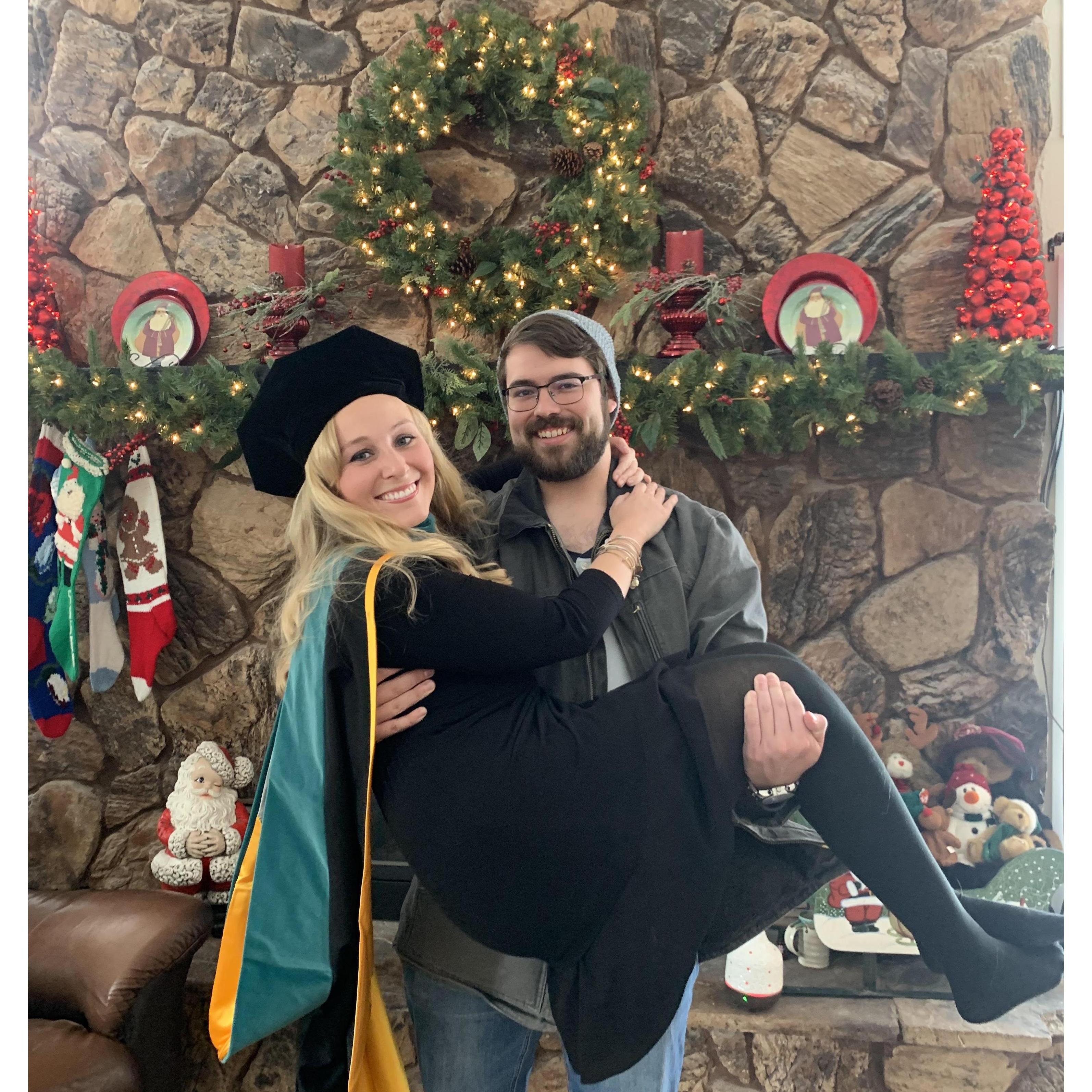 Syd graduating with her Doctorate