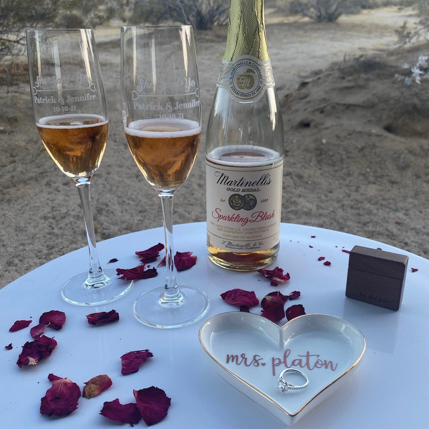 Patrick came prepared with gifts from the family. Personalized "She said yes!" champagne flutes from Jeff and Dina, and a Mrs. Platon ring dish from Chase and Lisa!