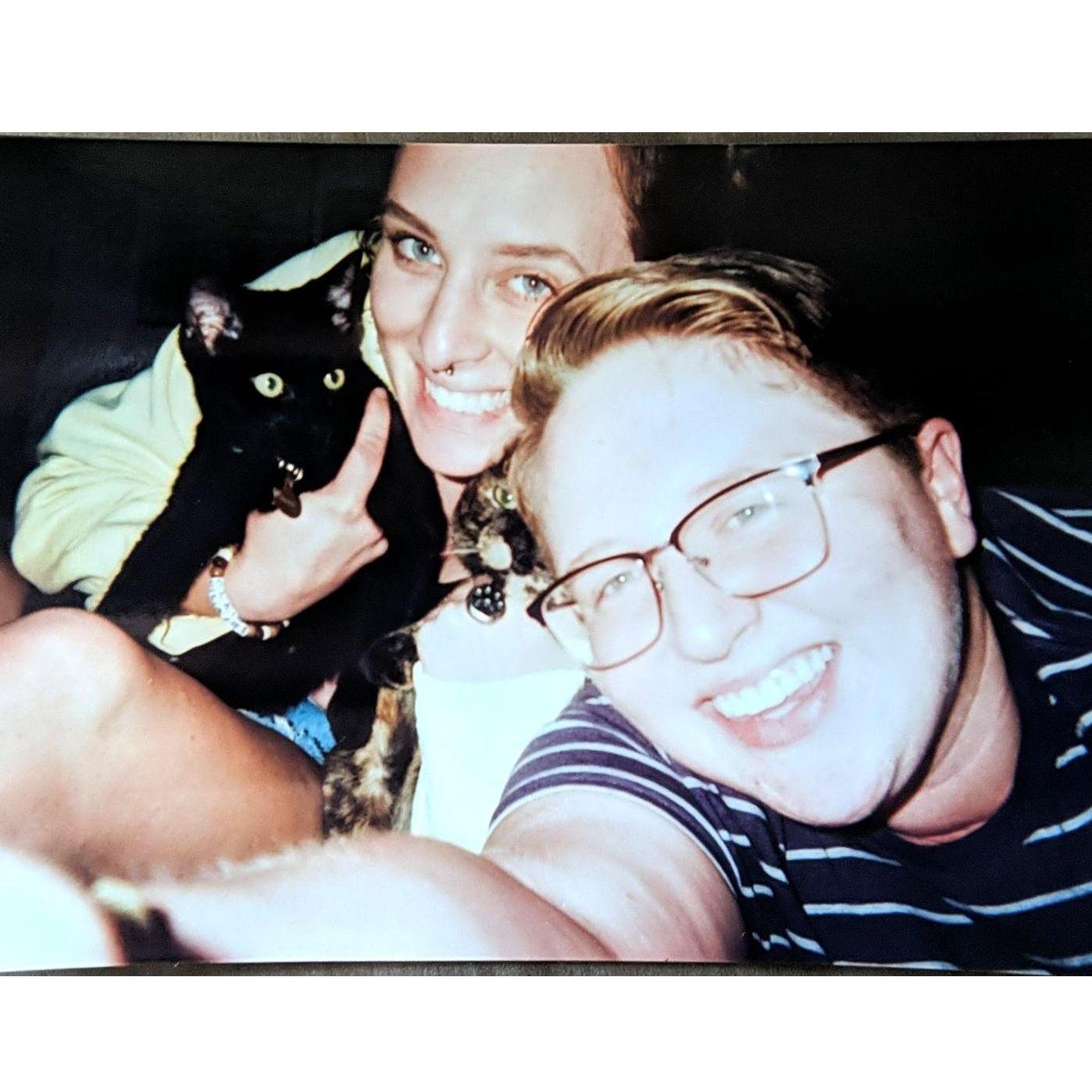 Family photo of us and our two cats shortly after we adopted Frank in the summer of 2019! (See if you can spot Cassie!)