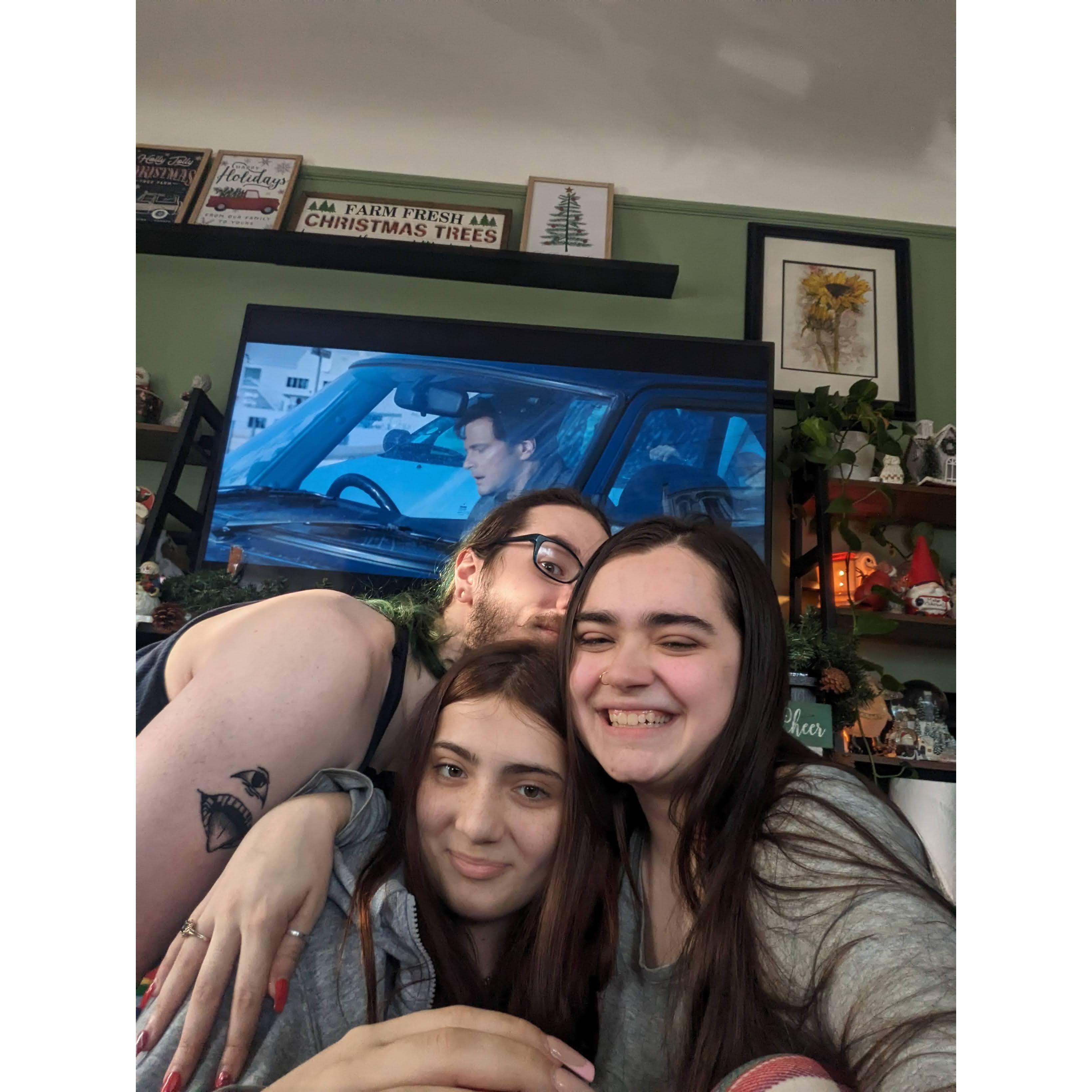 Blaise photobombing Laylah and Nadia on Christmas.