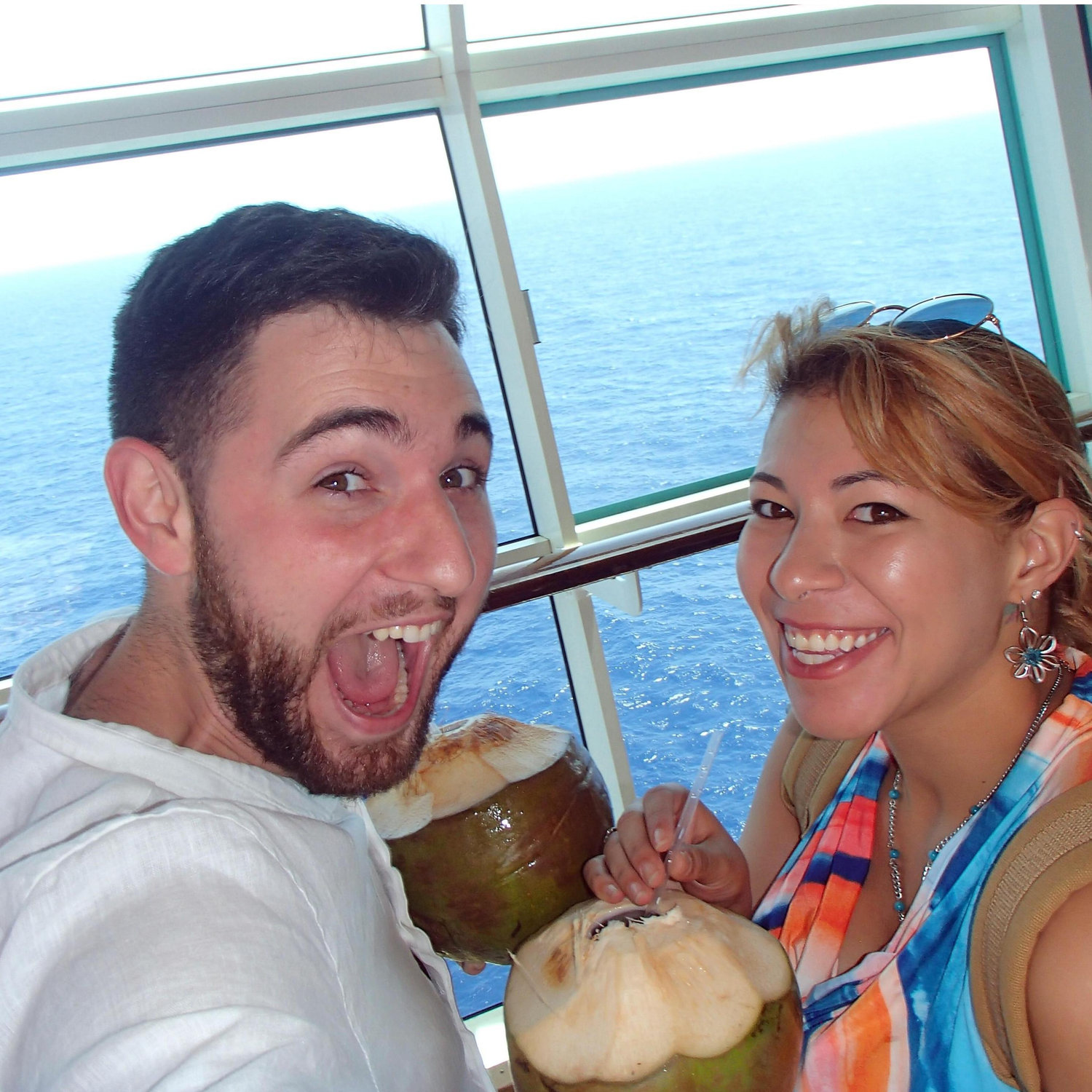 Our first ever cruise together in 2017 enjoying some tropical drinks.