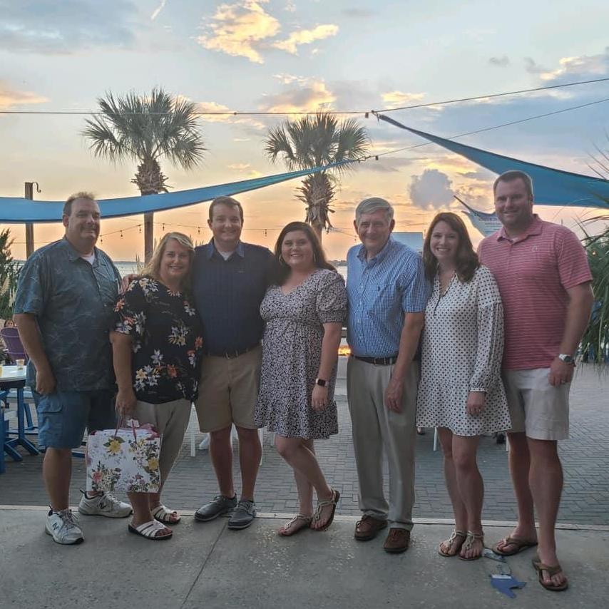 This picture was taken right after we got engaged! I could not believe Chris surprised me with most of our family in Charleston, SC!