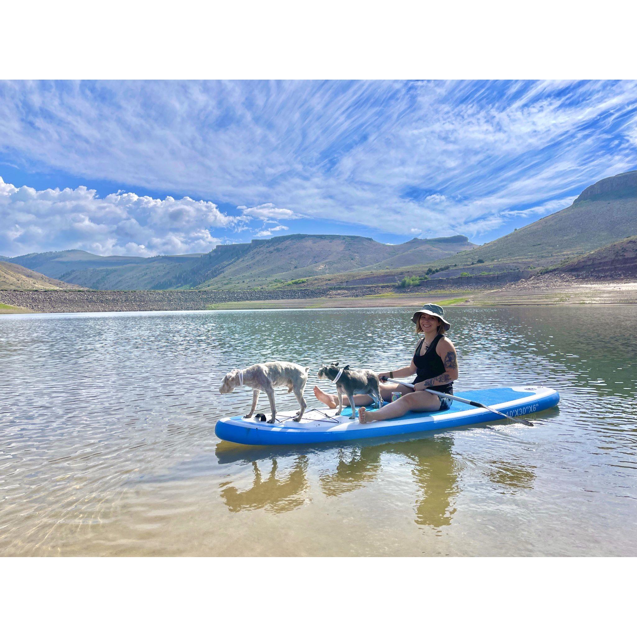 Family paddle boarding in Blue Mesa, Colorado