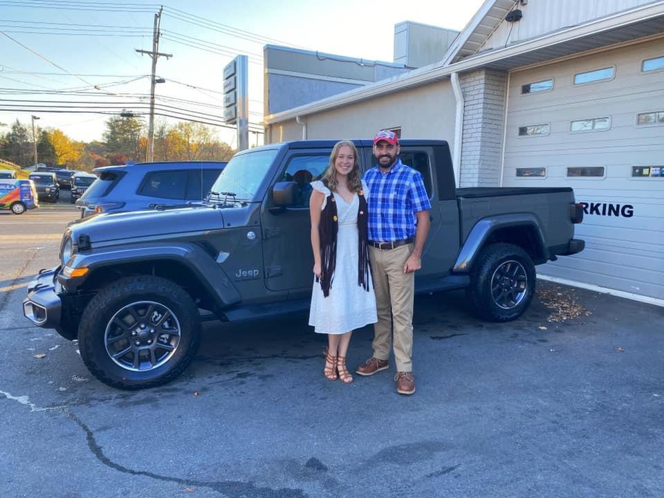 Picking up our new truck on Halloween dressed as Jenny and Forest Gump.