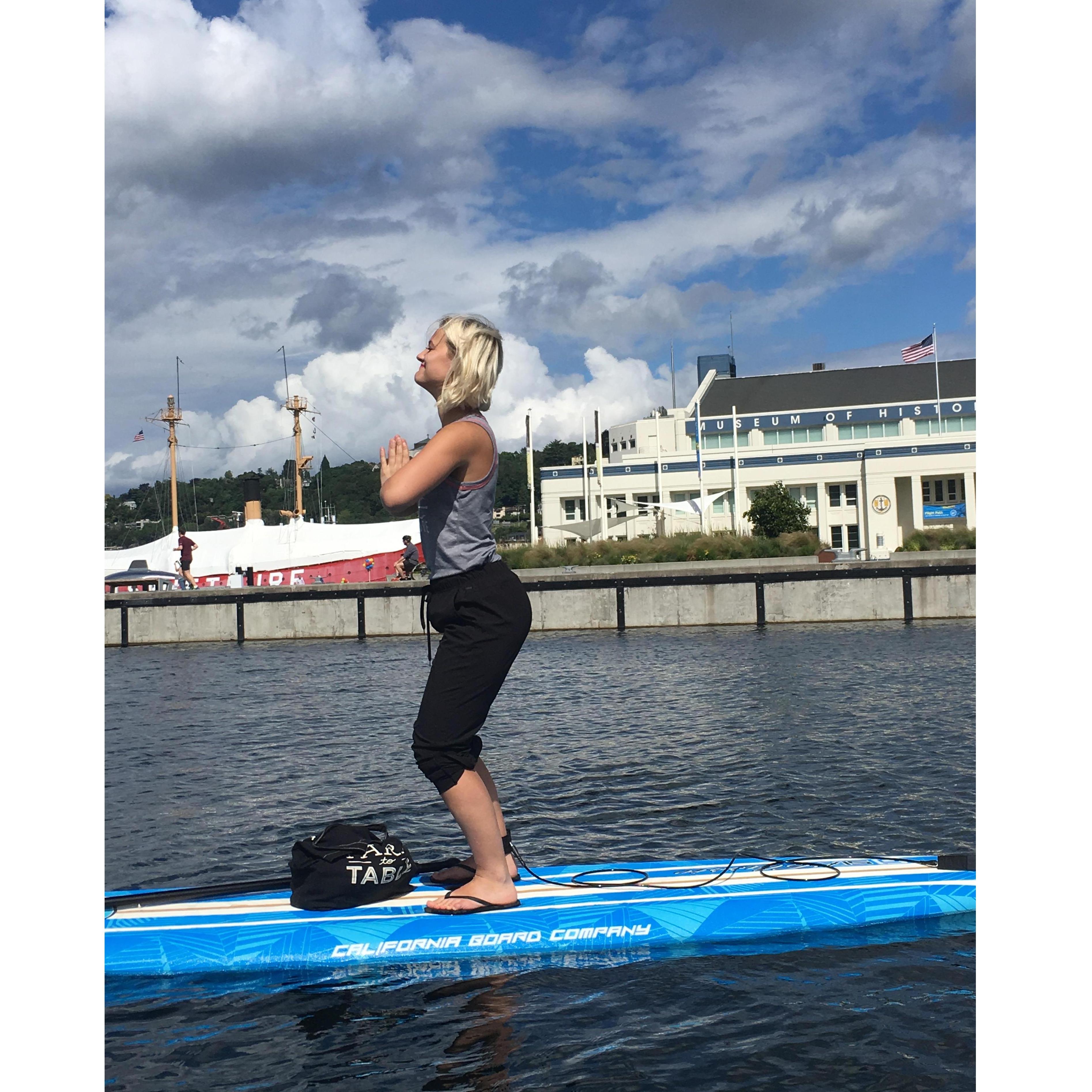 Yoga on a paddle board? She's so multitalented.