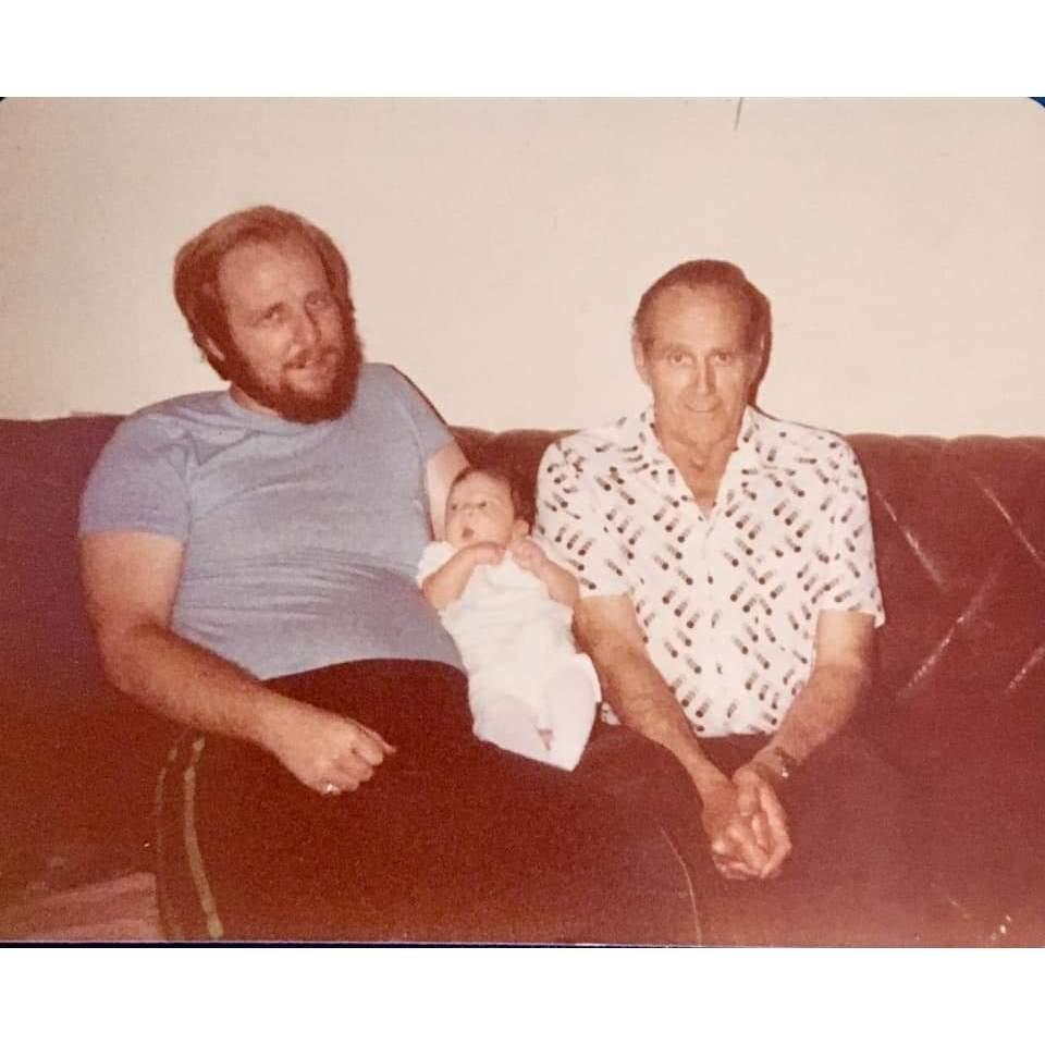 Baby Christina with her dad and Grandpa Cookie