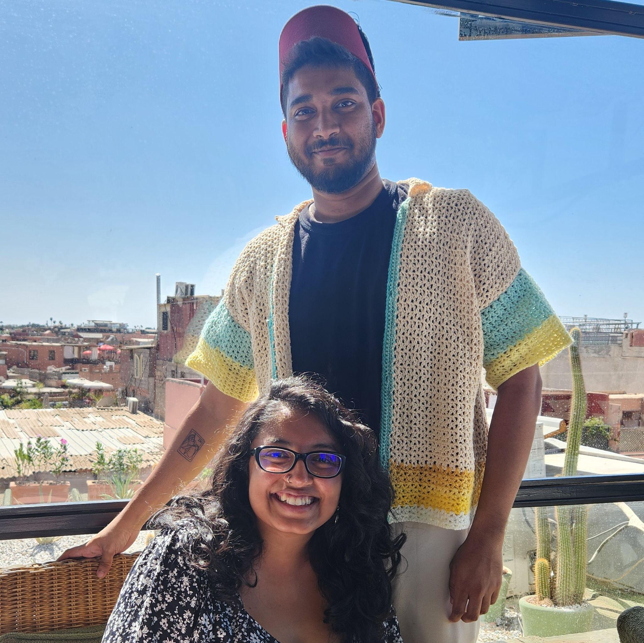 Micah wearing the shirt Alisha crocheted and a hat borrowed from our Moroccan waiter