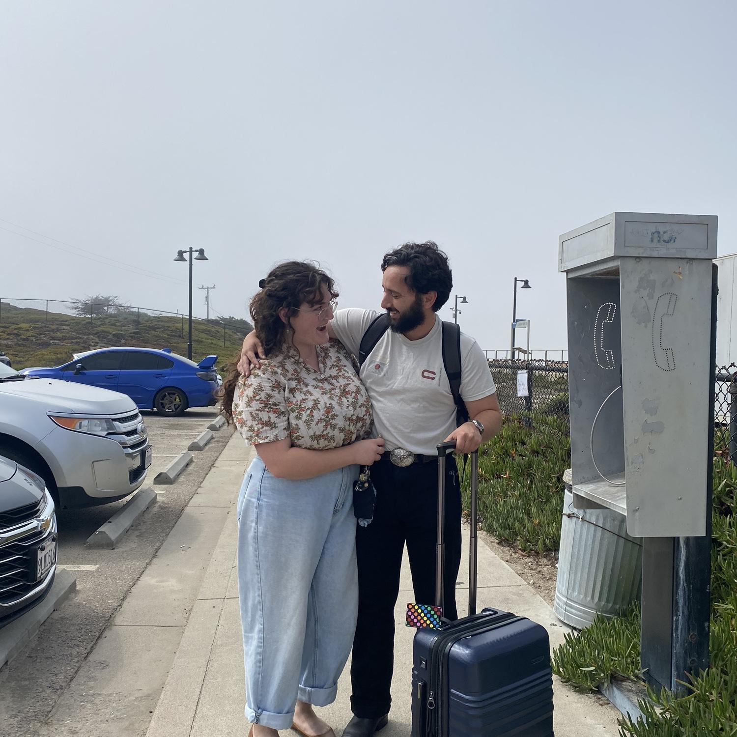09•07•24 This is a very spontaneous picture of Matthew & Savannah. While Savannah was picking Matthew up from the train station and greeting him, a random lady approached and offered to take a pic!