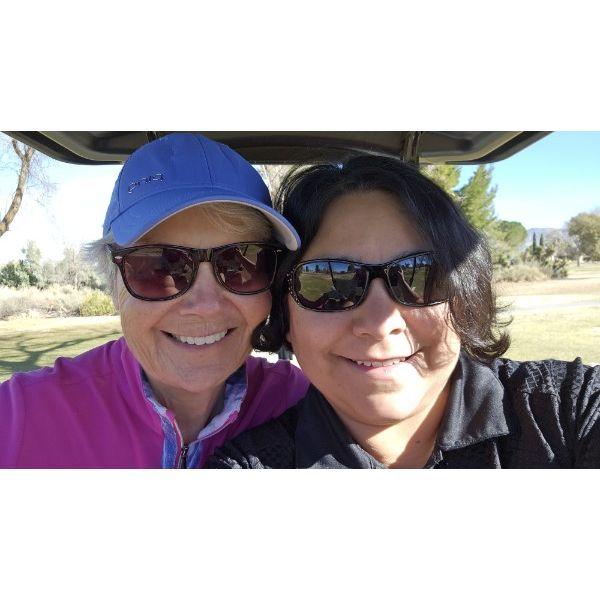 Anne and I playing golf.