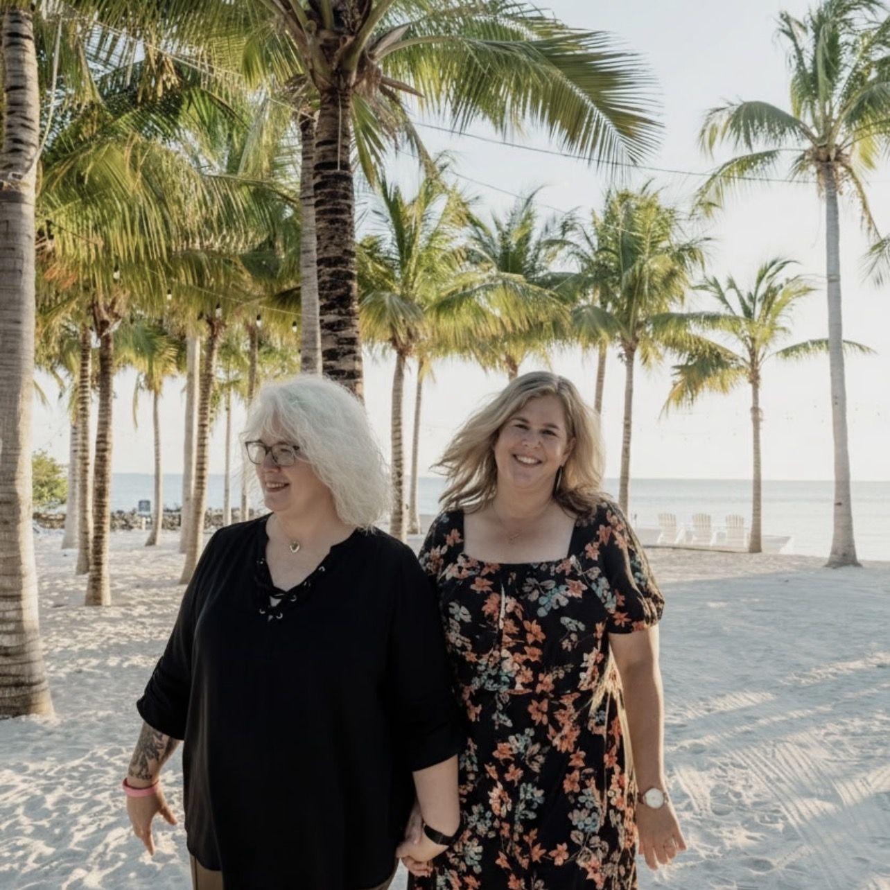 If Kristy looks relieved, it's because she pulled off the best surprise proposal! Her perfect planning went without a hitch...minus children photobombing, and rolling around in the sand.