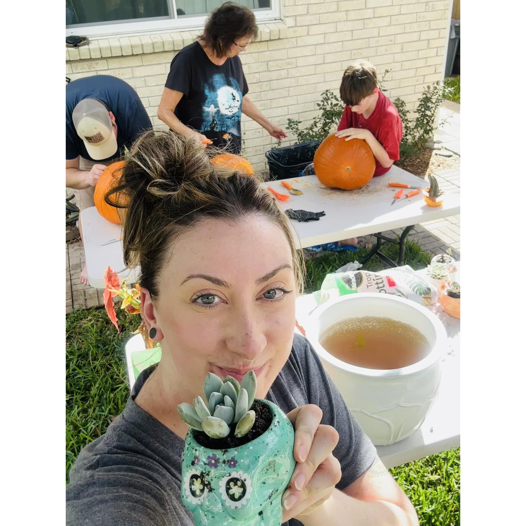 Kathryn planted succulents using planters that were gifts from Aaron's mom, Trish, instead. Aaron and Kathryn received a lot of support and approval from their parents for their relationship.