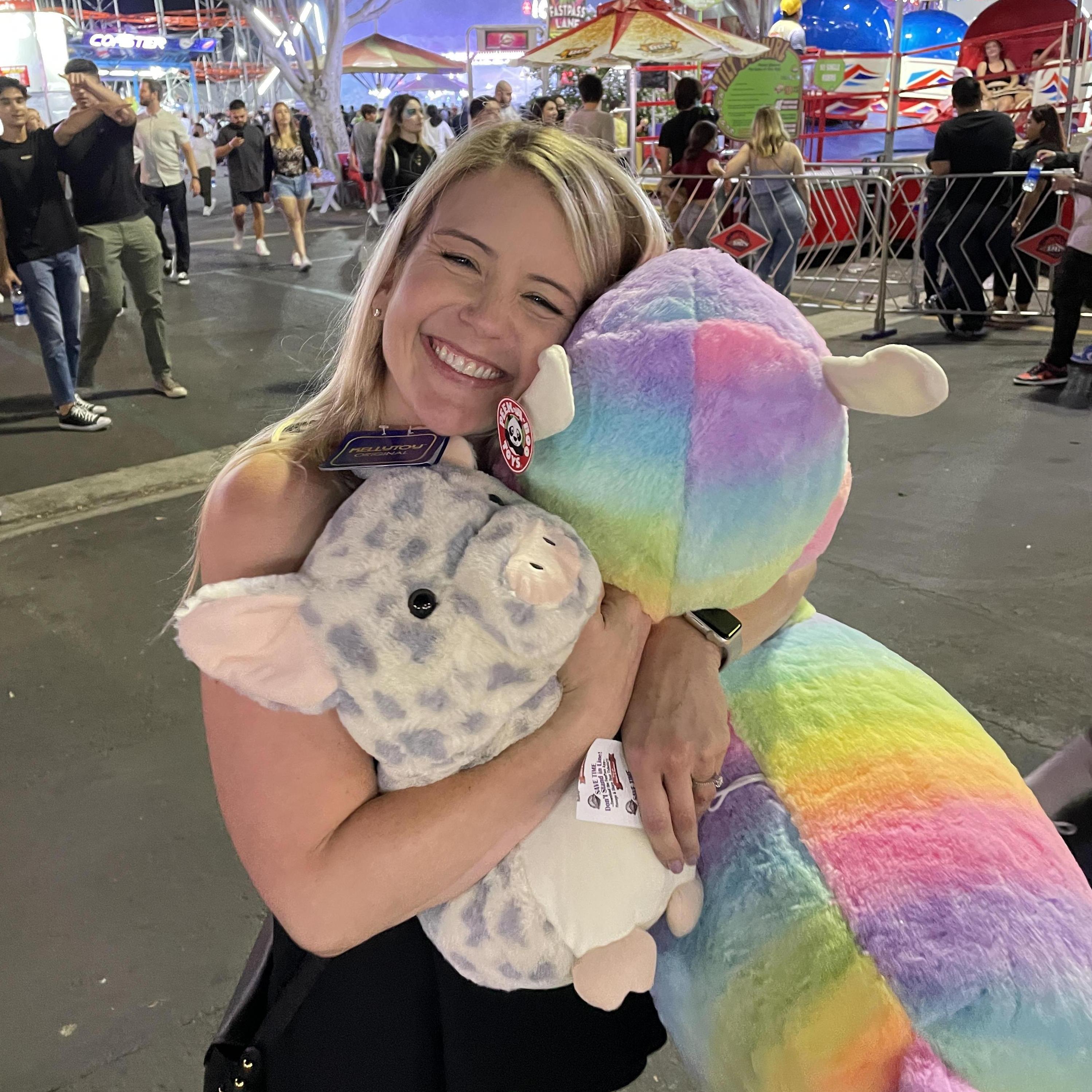 My Jen loving her OC Fair game winnings.