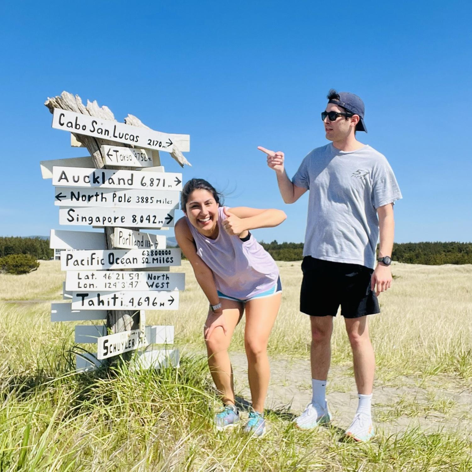May 2023: Our first photo at the sign. We weren't dating yet!