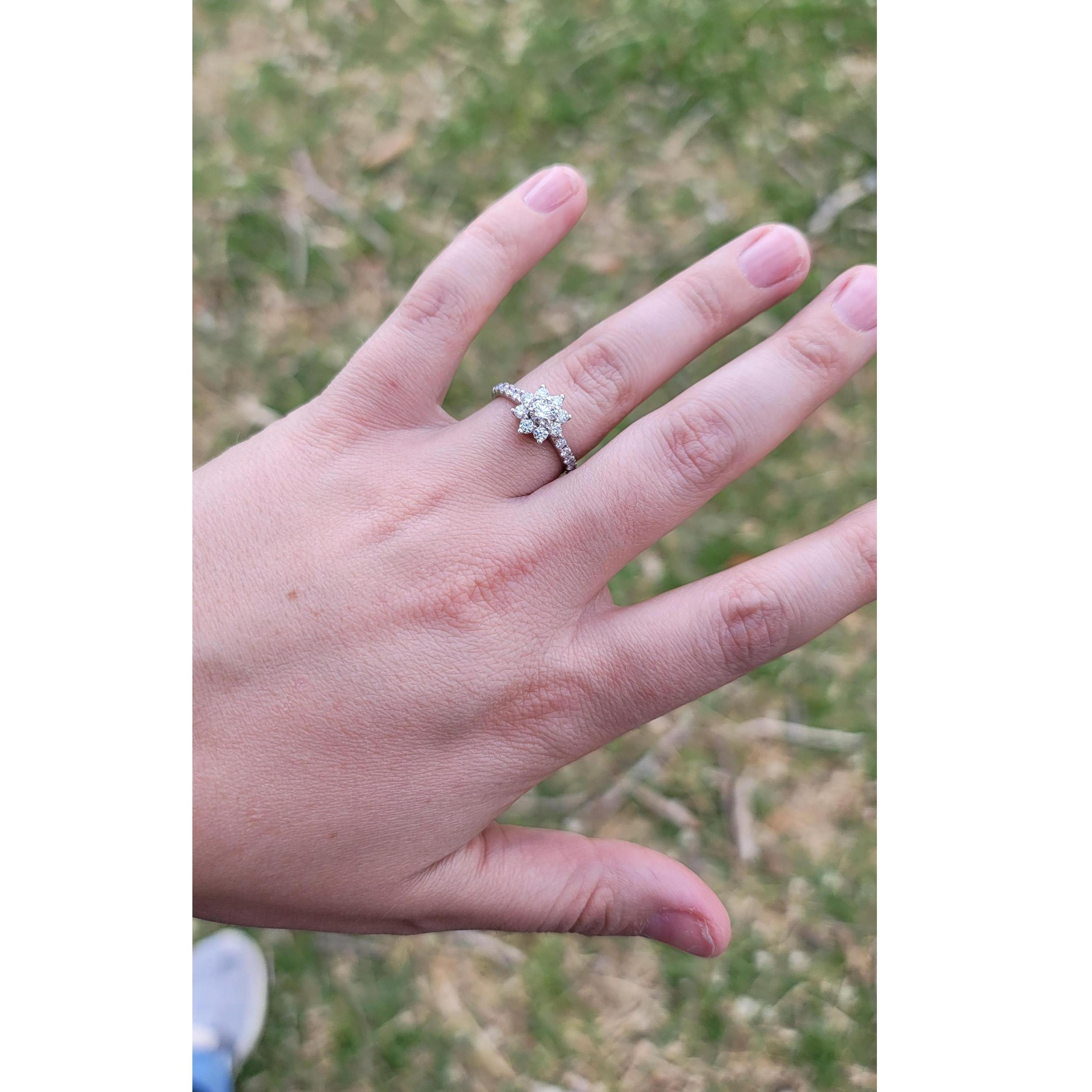 The ring (After Tyler went and got her nails done since she was kind of caught off-guard :D)