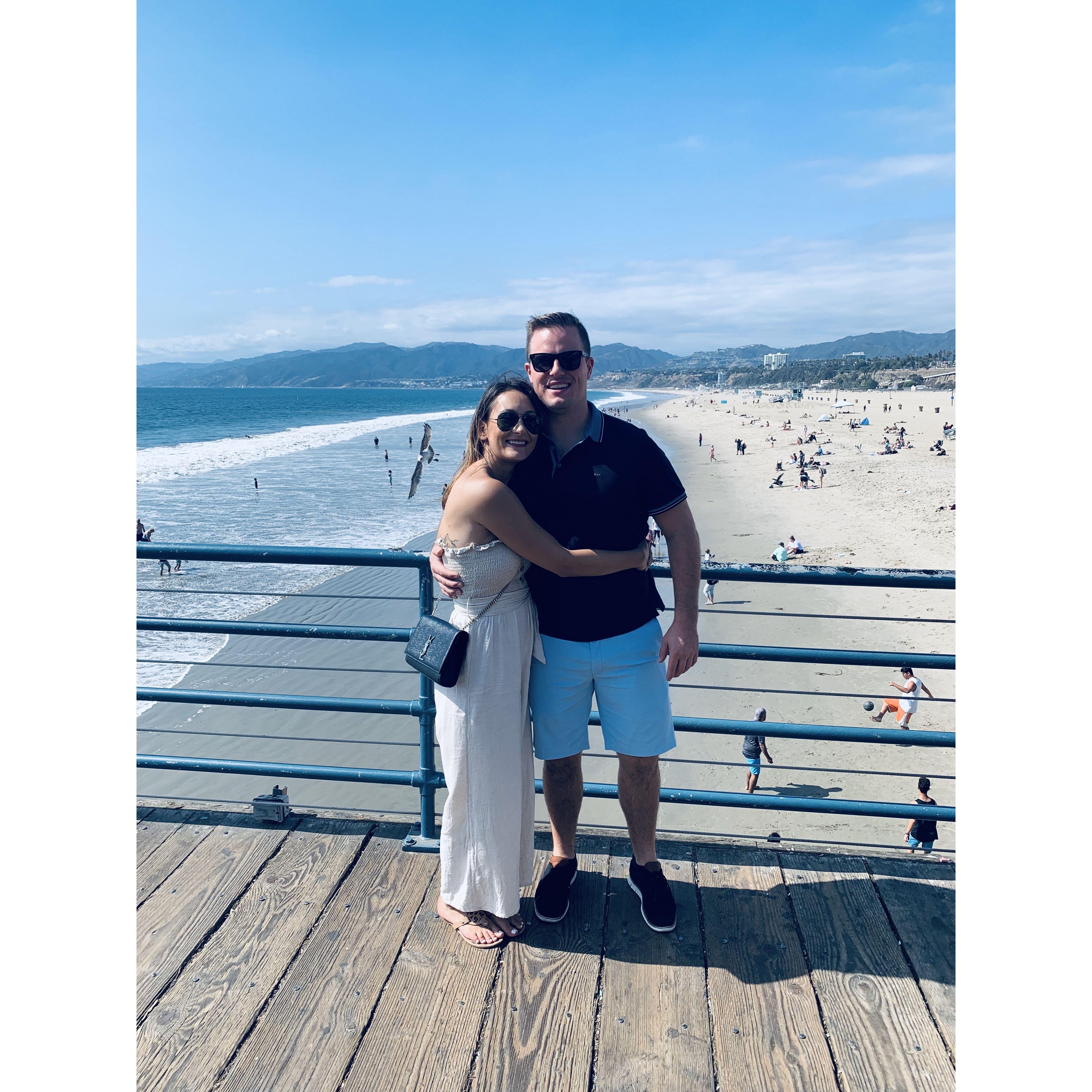 First trip together to Los Angeles enjoying the Santa Monica pier.