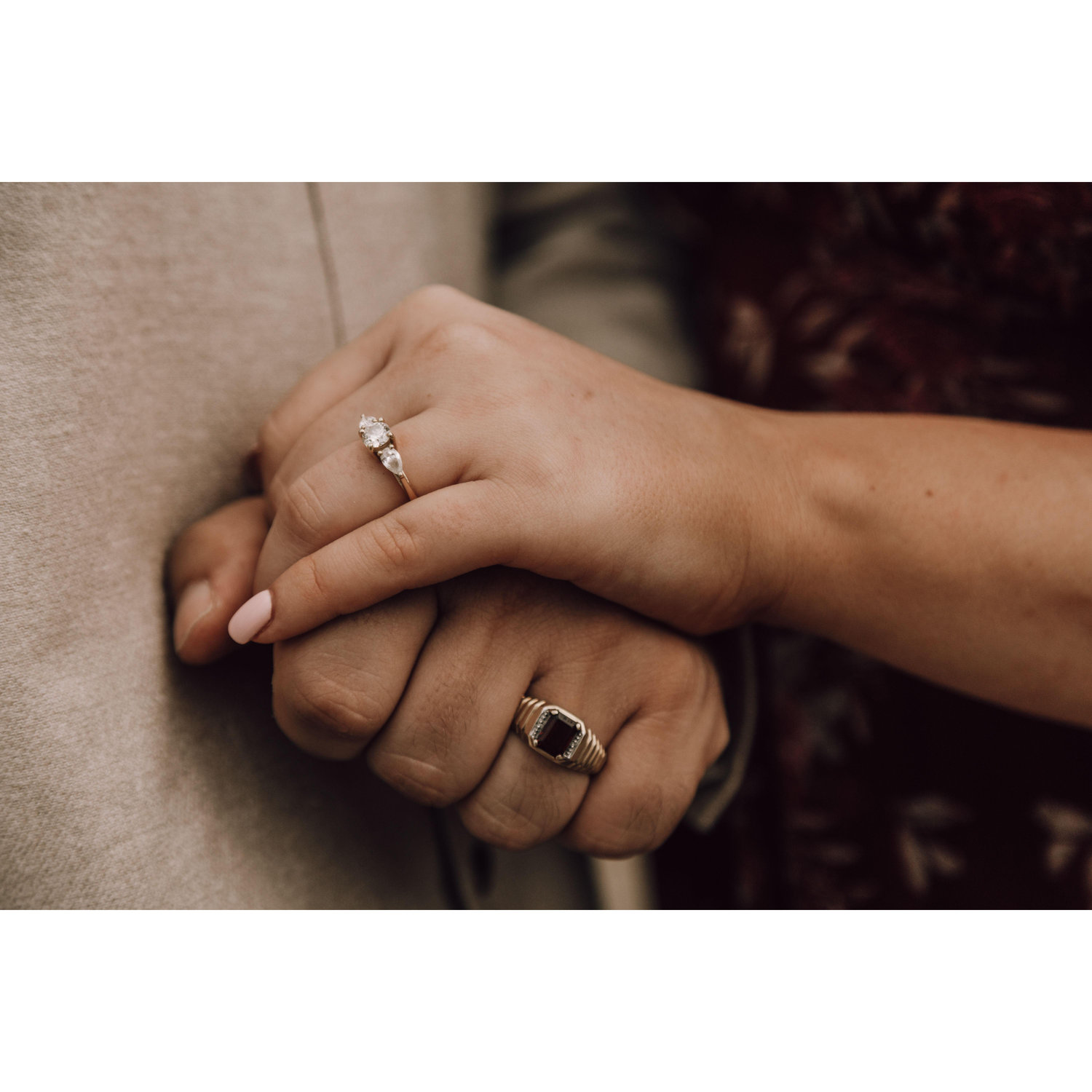 Our engagement rings. Casie's with his grandmother's centerstone, and Branson's with her grandfathers ring.