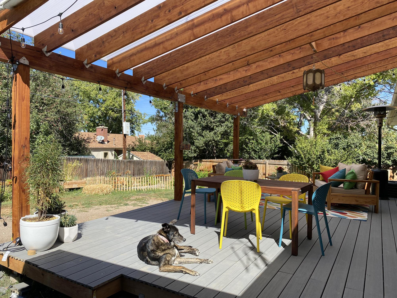 We spent the whole summer of 2021 working on this outdoor space. Here's the finished product, featuring Luna!