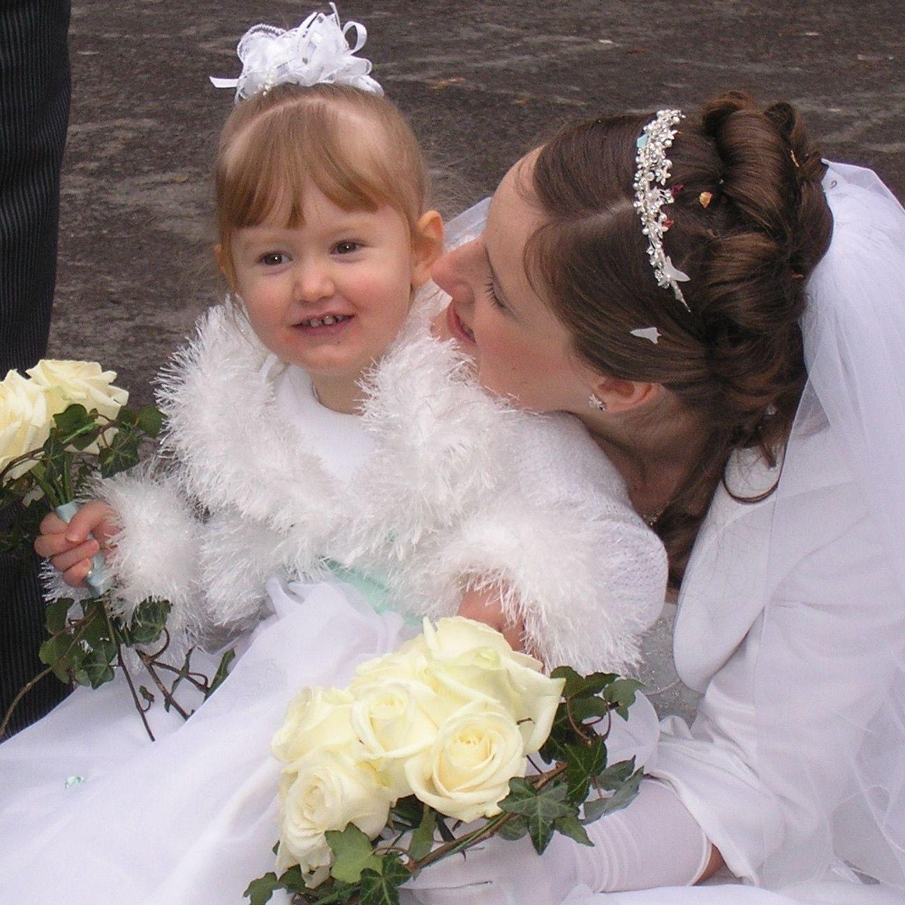 The bride the last time she was in a wedding (her aunt's as a flower girl)