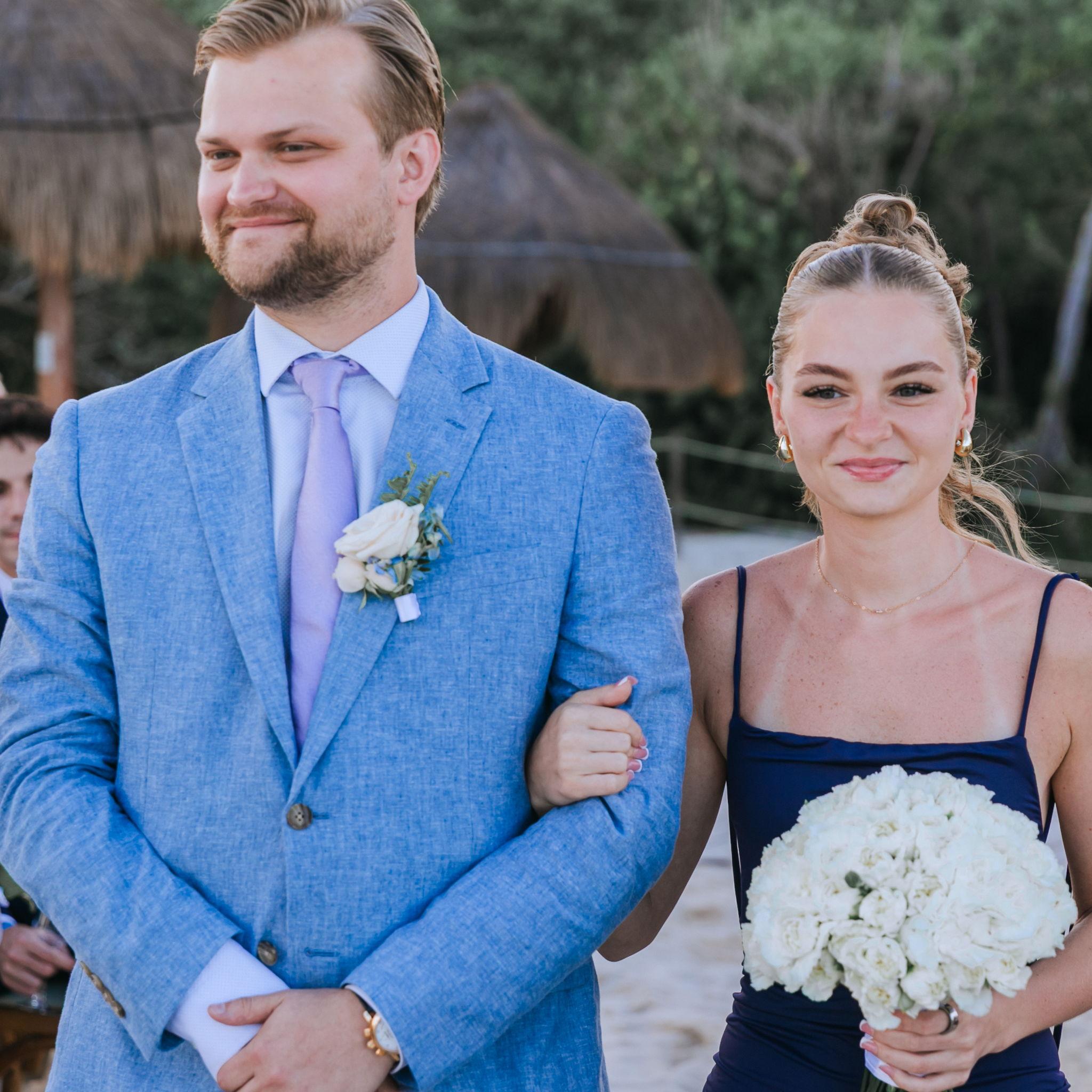 Henry walked with his sister down the aisle to an instrumental cover of Married Life.