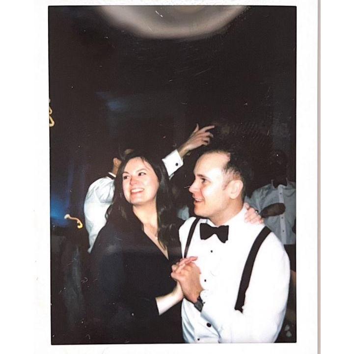 Dancing at Tom's brother's wedding. December 2022
