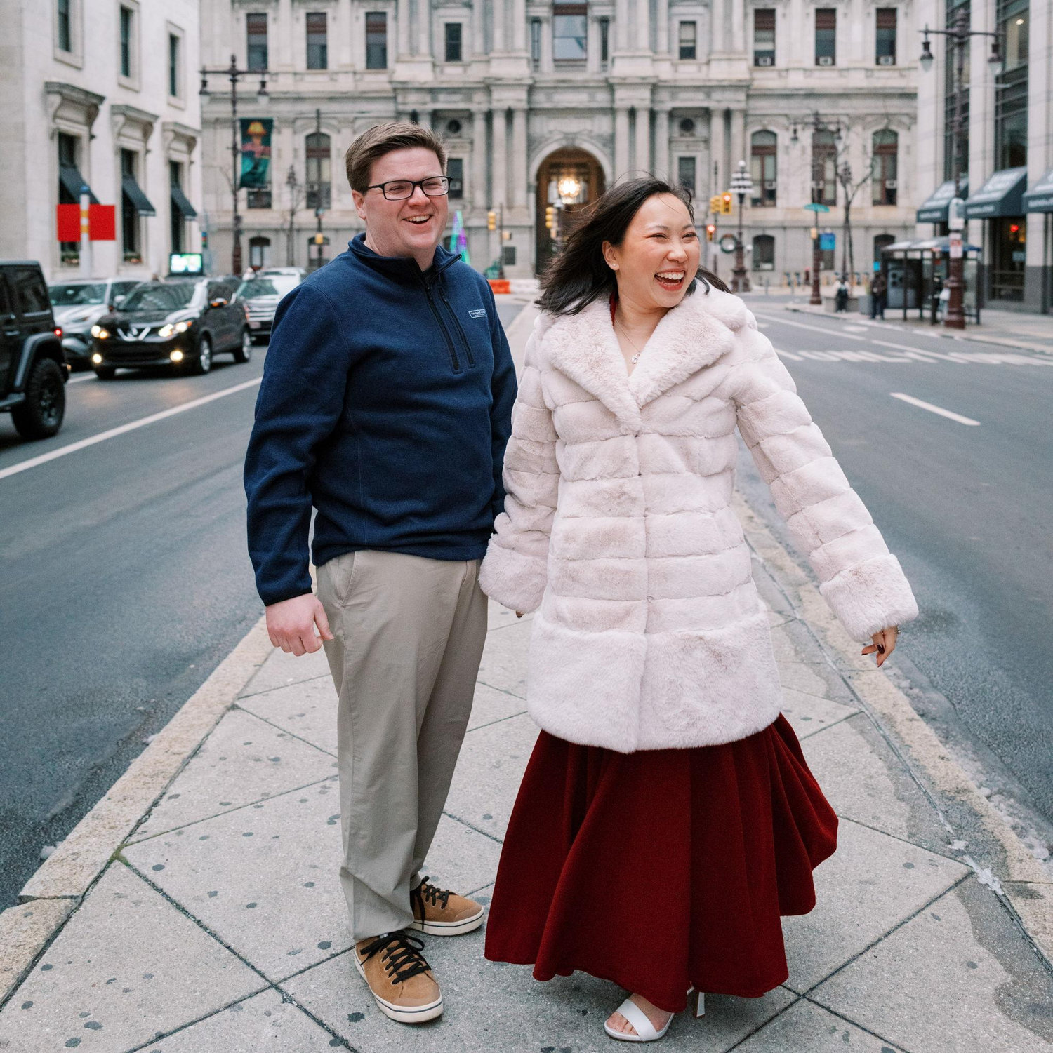 Someone in the crosswalk shouted "They're getting married!" while we were in the middle of pictures. This is the candid photo of us laughing in response!