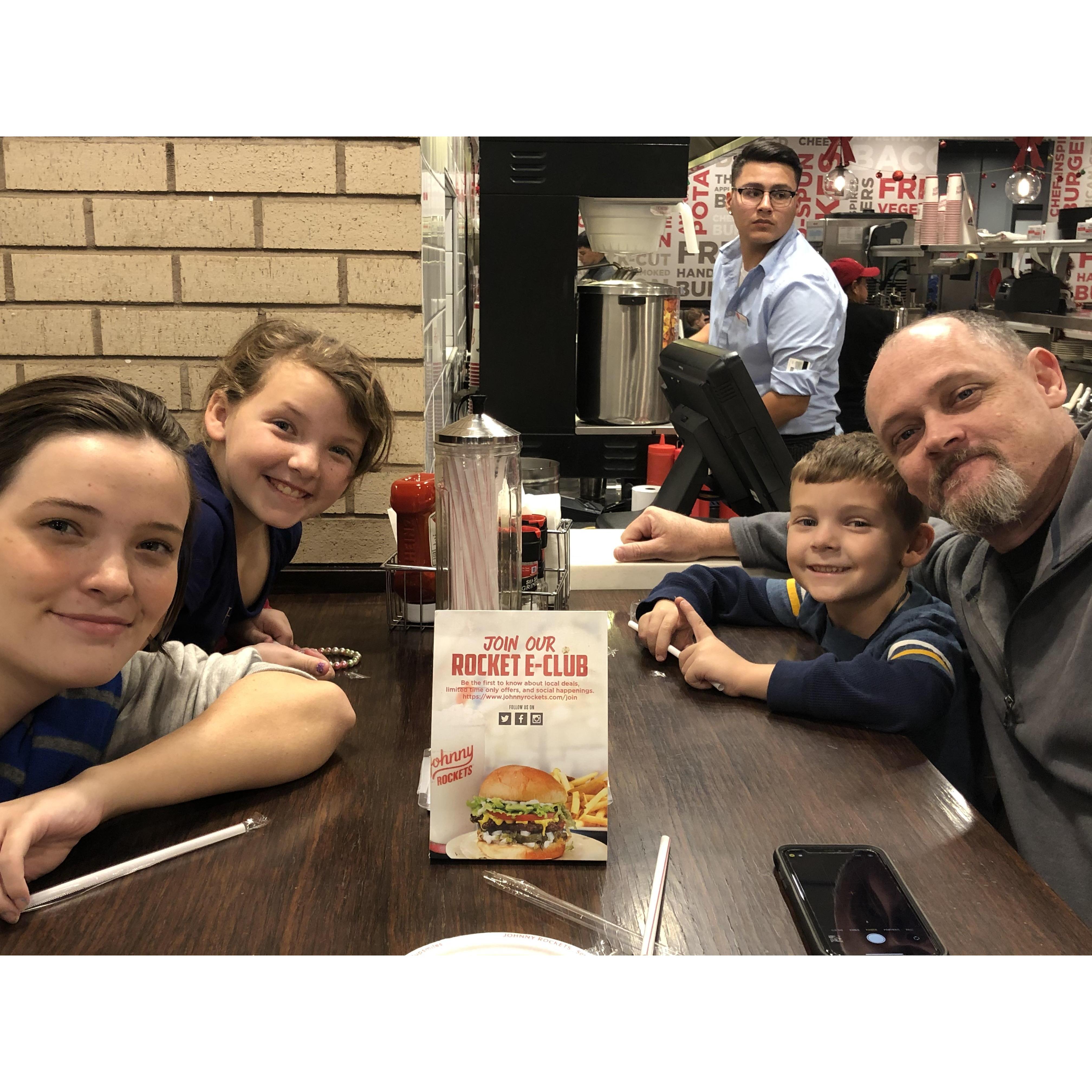 Jason with his nieces and nephew in Phoenix