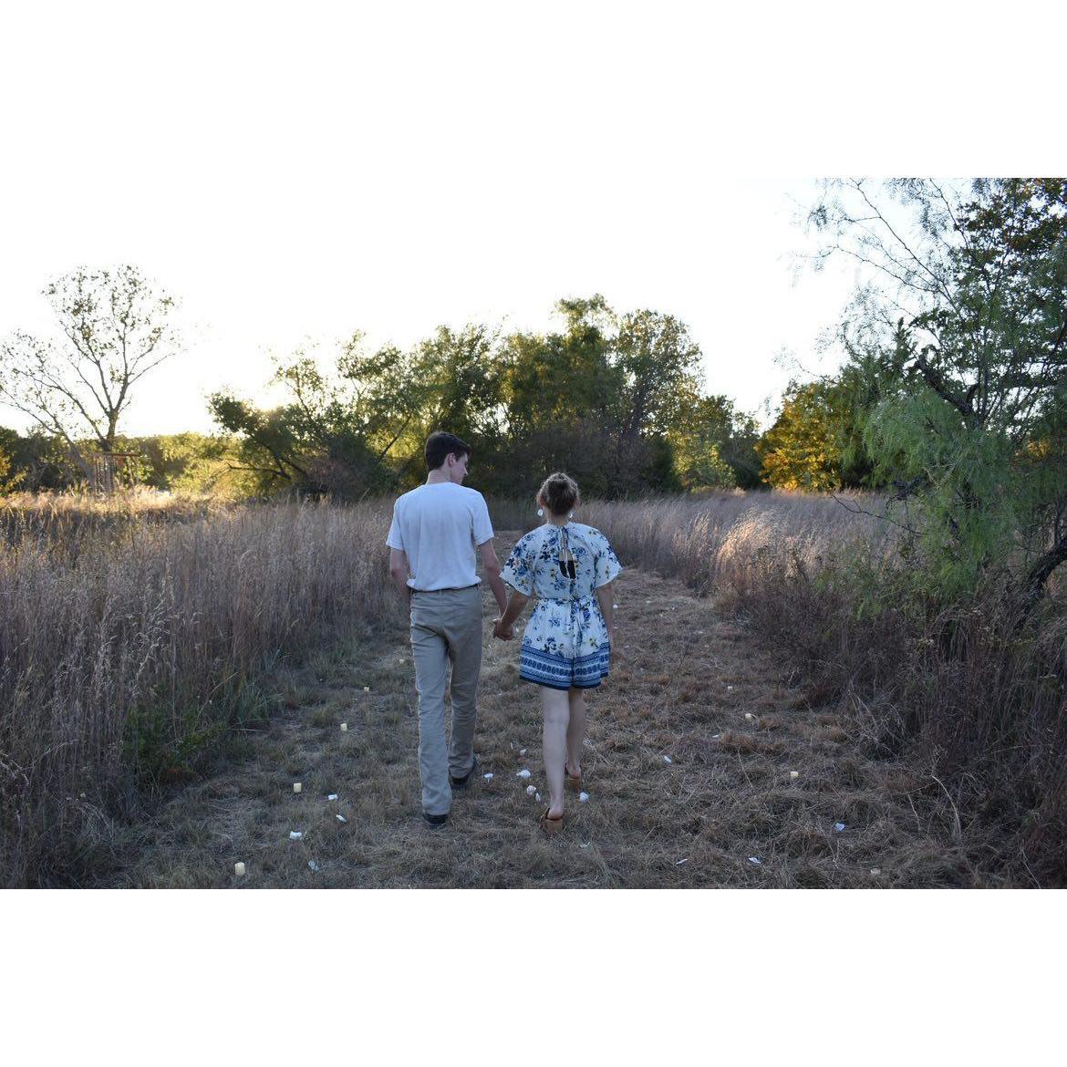 Even with all the many little hints, it took him kneeling for me to realize he was proposing to me!