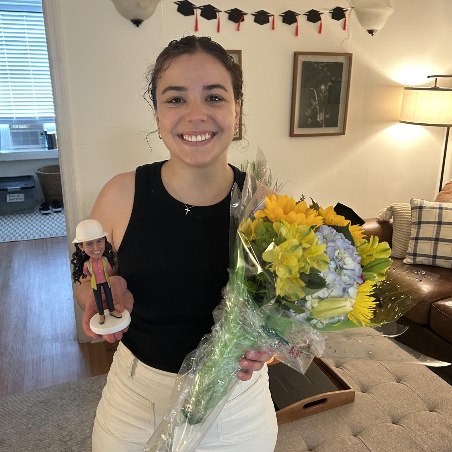 Olivia graduates with her Master’s degree.