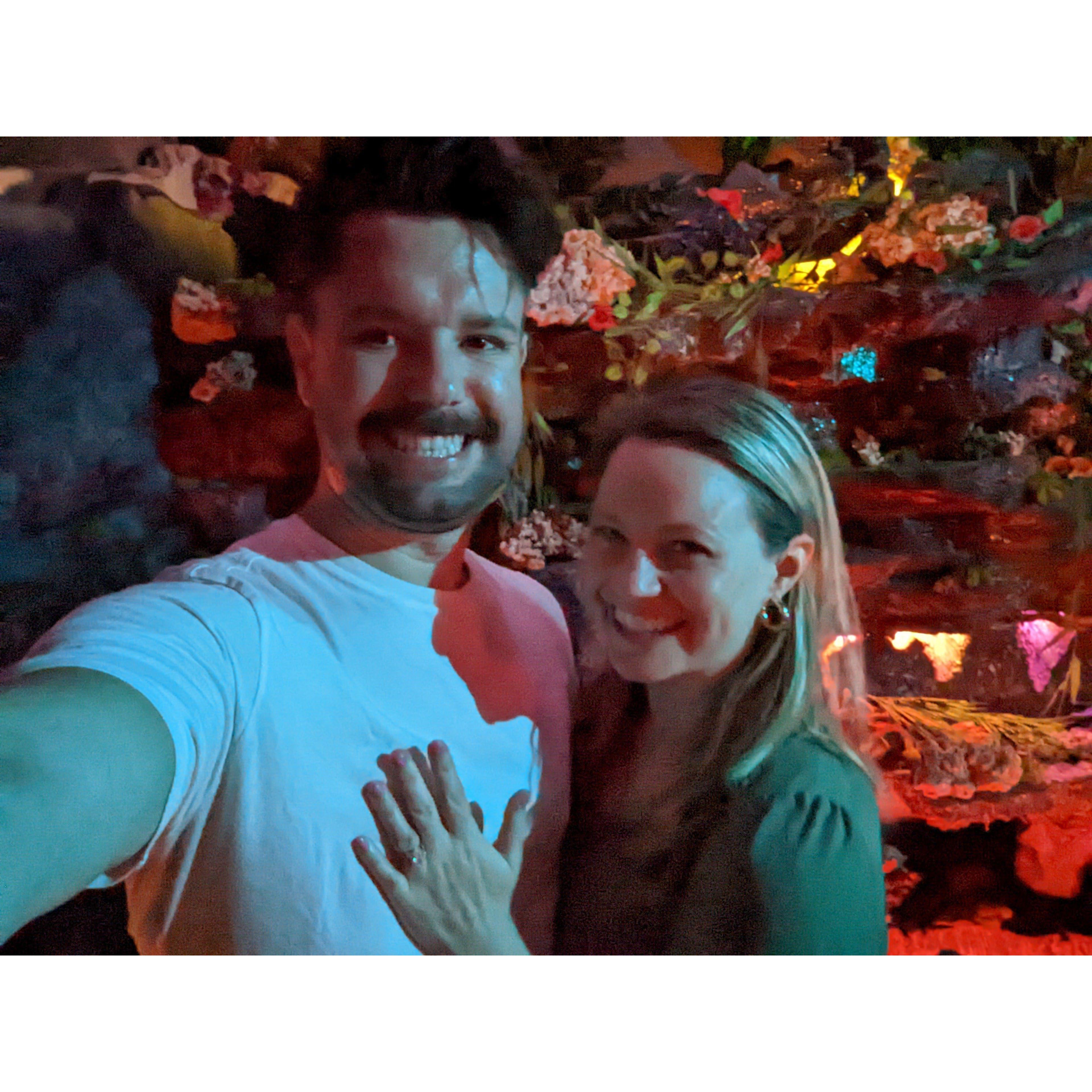 This is the night Cayman proposed to Jillian. They're celebrating with tiki drinks at Pagan Idol in SF