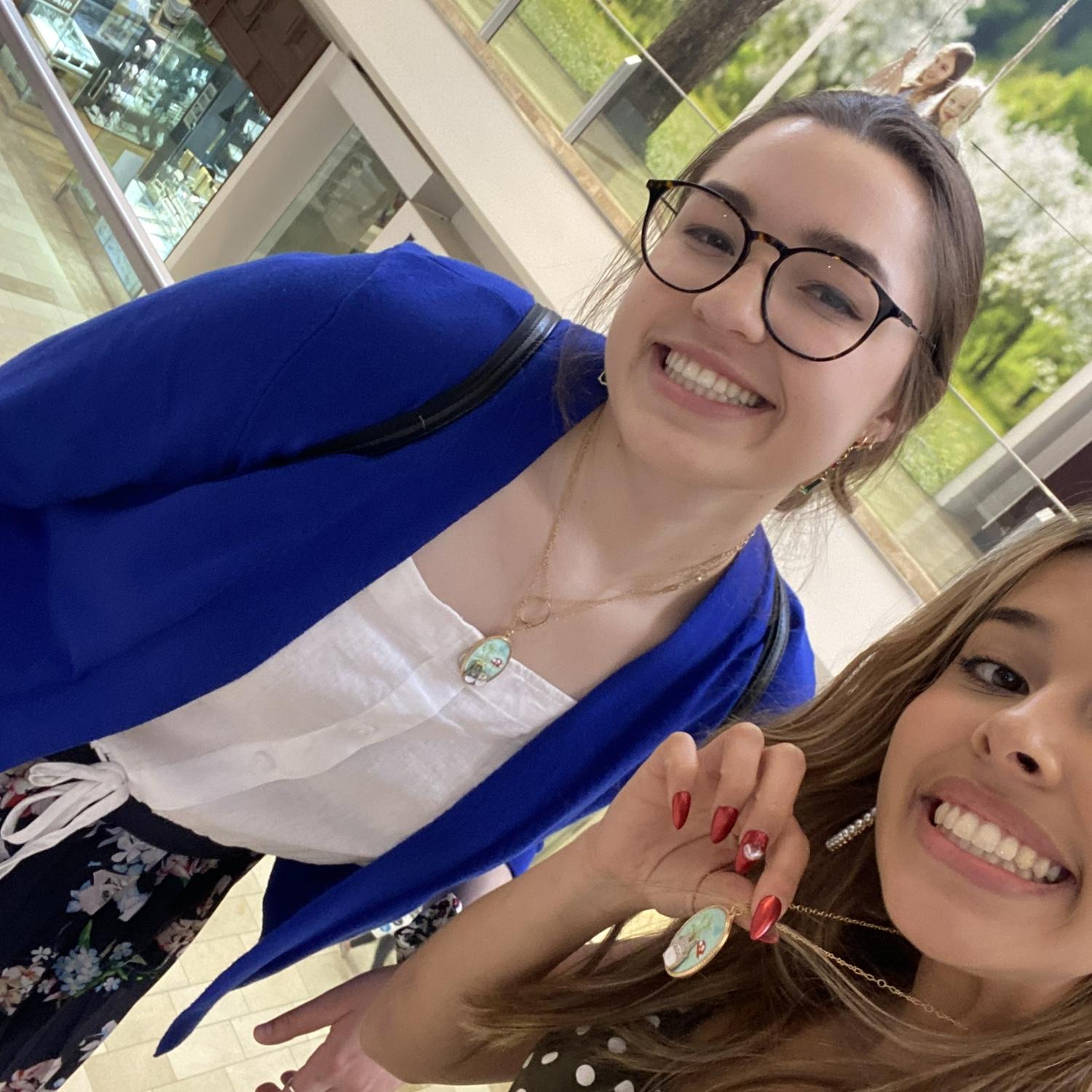 Stacy and Eliana with matching Hot Topic necklaces like true 2010s besties