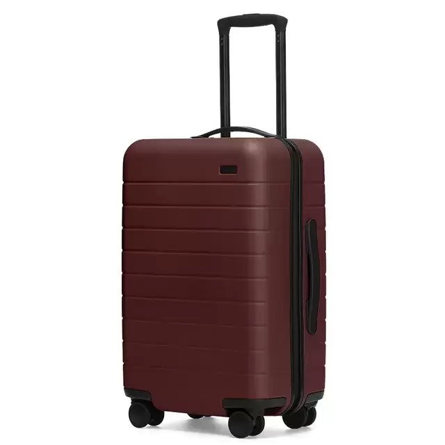 The Carry-On by Away (Coast, Green or Brick)