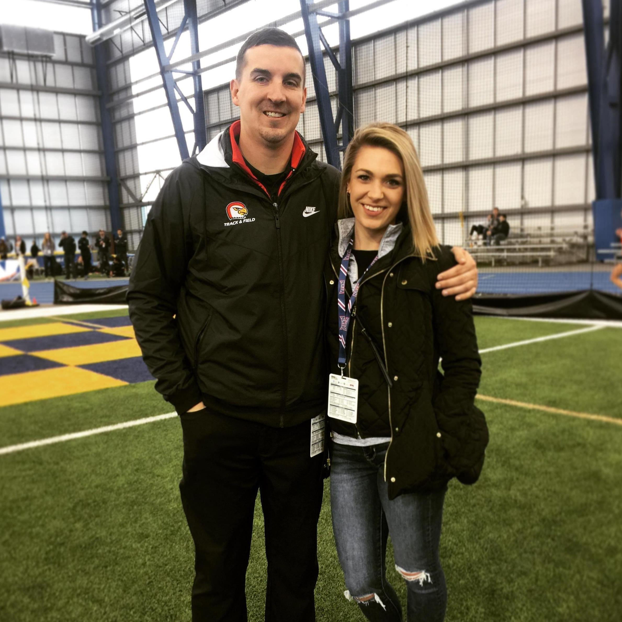Cole coaching at the indoor nationals track and field meet in Brookings, SD in 2019. Rachel drove up to come watch and support for the day.