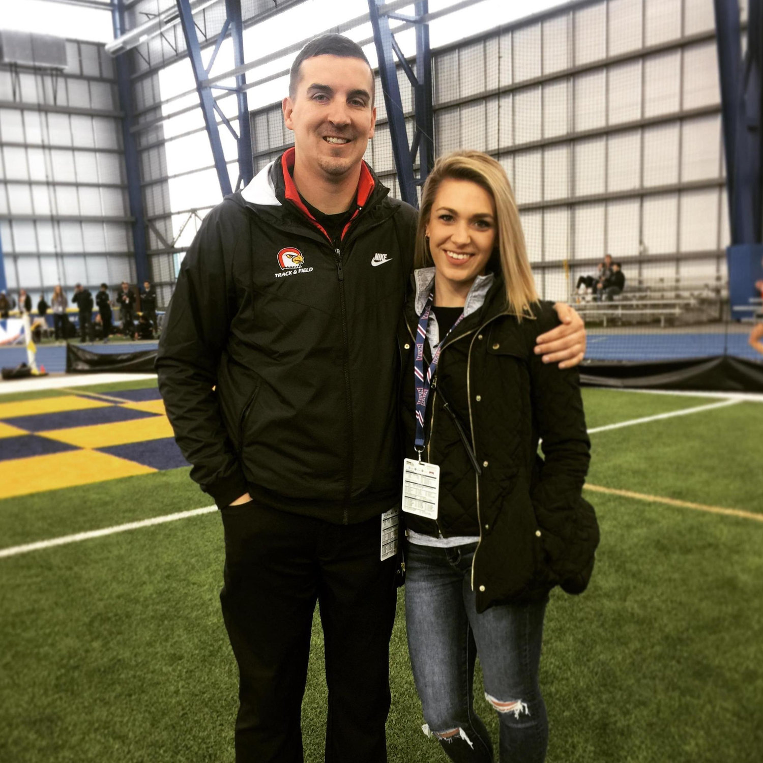 Cole coaching at the indoor nationals track and field meet in Brookings, SD in 2019. Rachel drove up to come watch and support for the day.