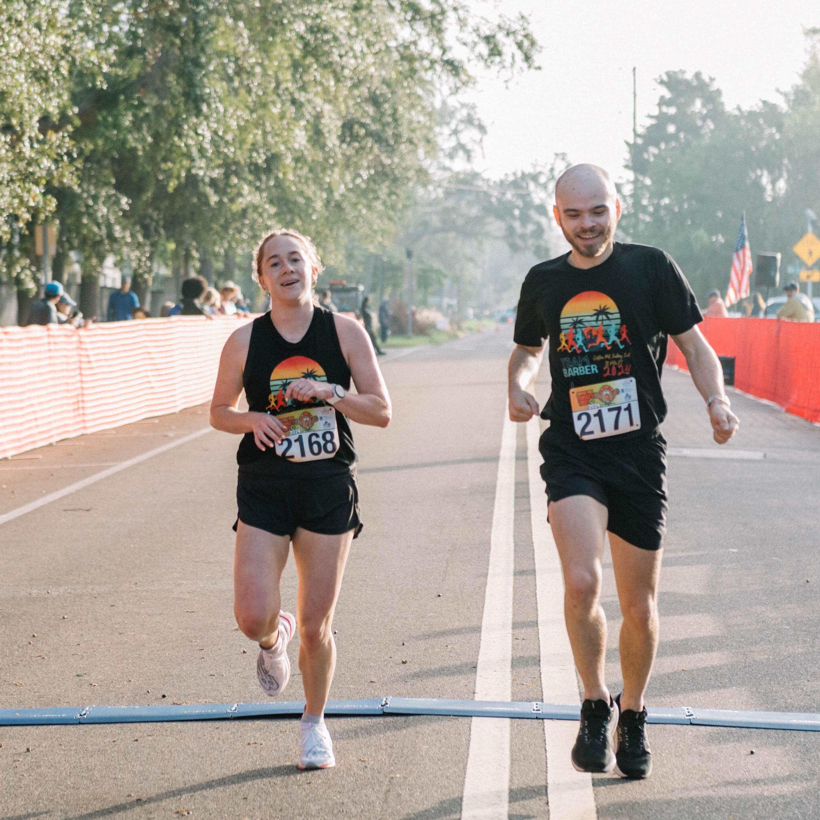 Barrett assisting Meredith's turkey trot win in FL for Thanksgiving 2024