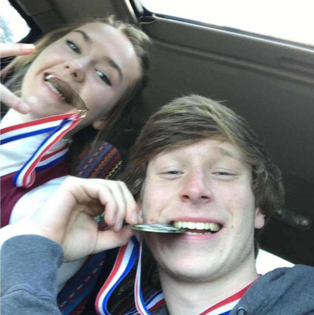Not only was this our first (and last) track meet together, it was also the day we had our first peck (we'd call it a kiss but that's too generous).