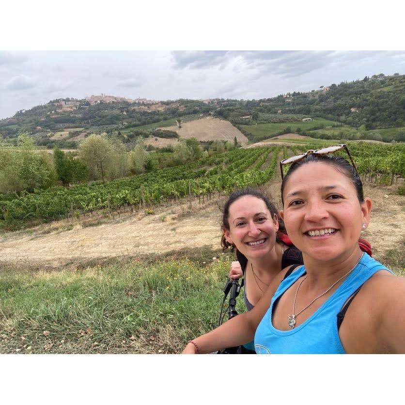 Us e-biking through the Tuscan hills after Angier proposed to me in Montepulciano, Italy