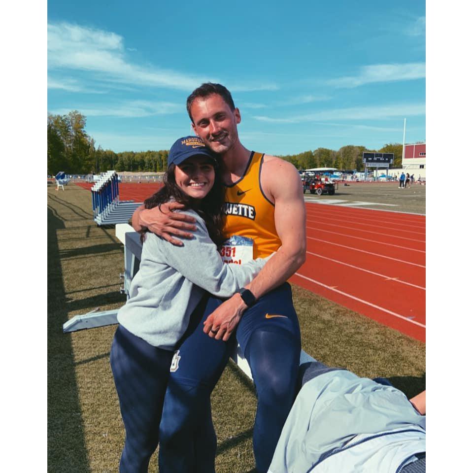Dan's biggest fan! Ashley loved watching Dan as captain of Marquette's Track & Field team.