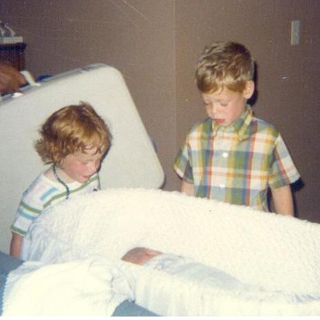 Tom and Kathy, very non-plussed at the sight of their new brother Dan.