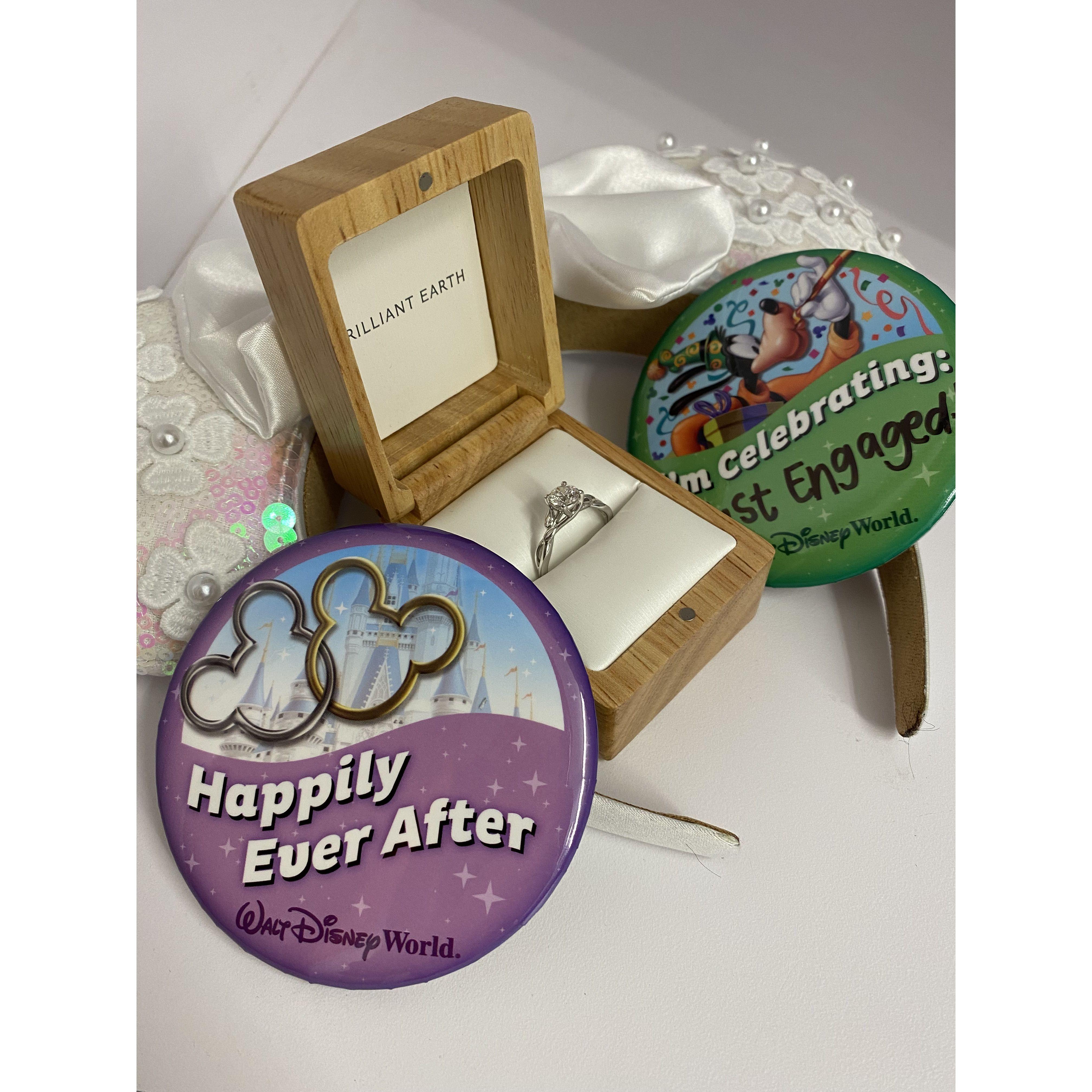 My ring with my bride mouse ears and celebration buttons