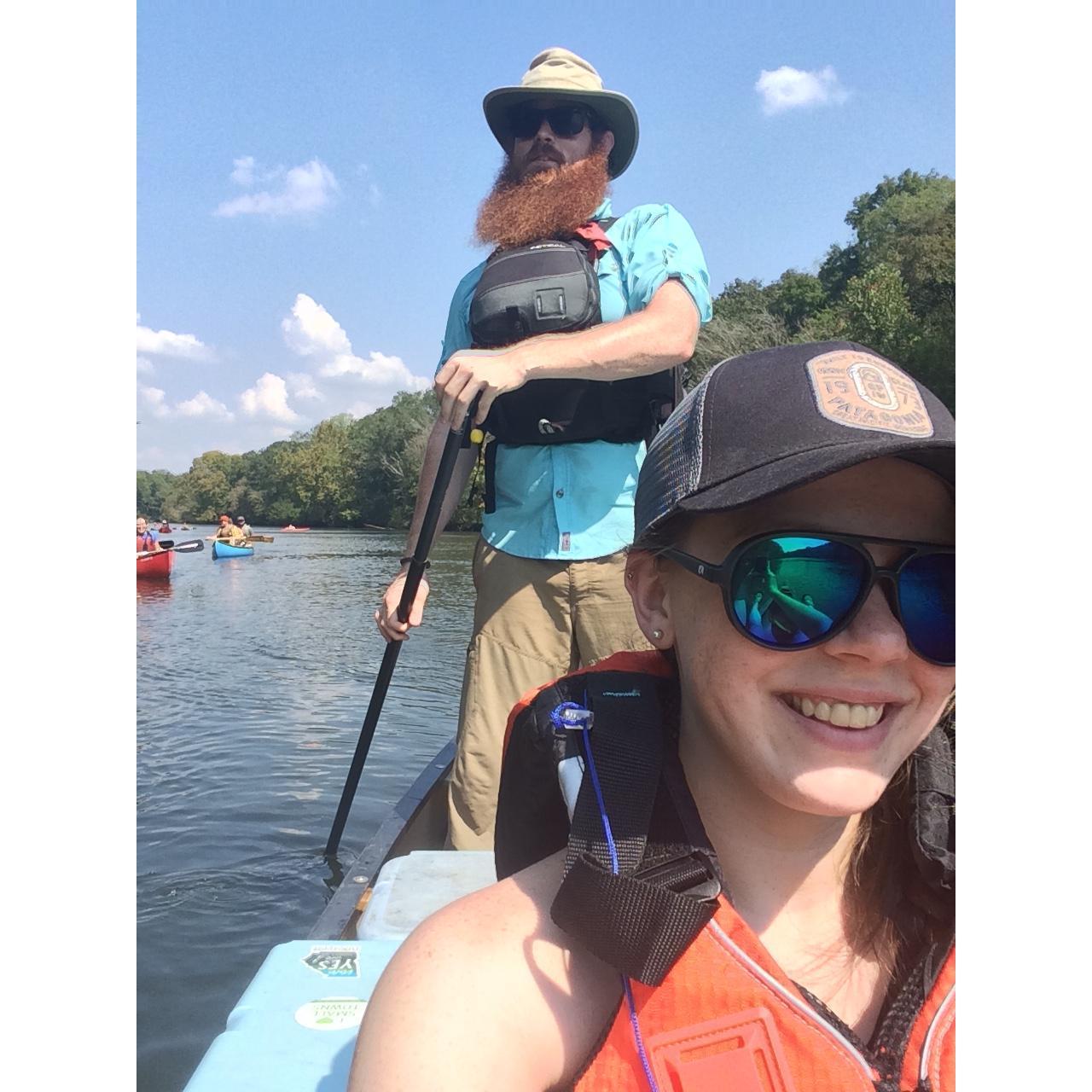 Clark decided to stand up in the canoe and borrow Emily's paddleboard paddle.