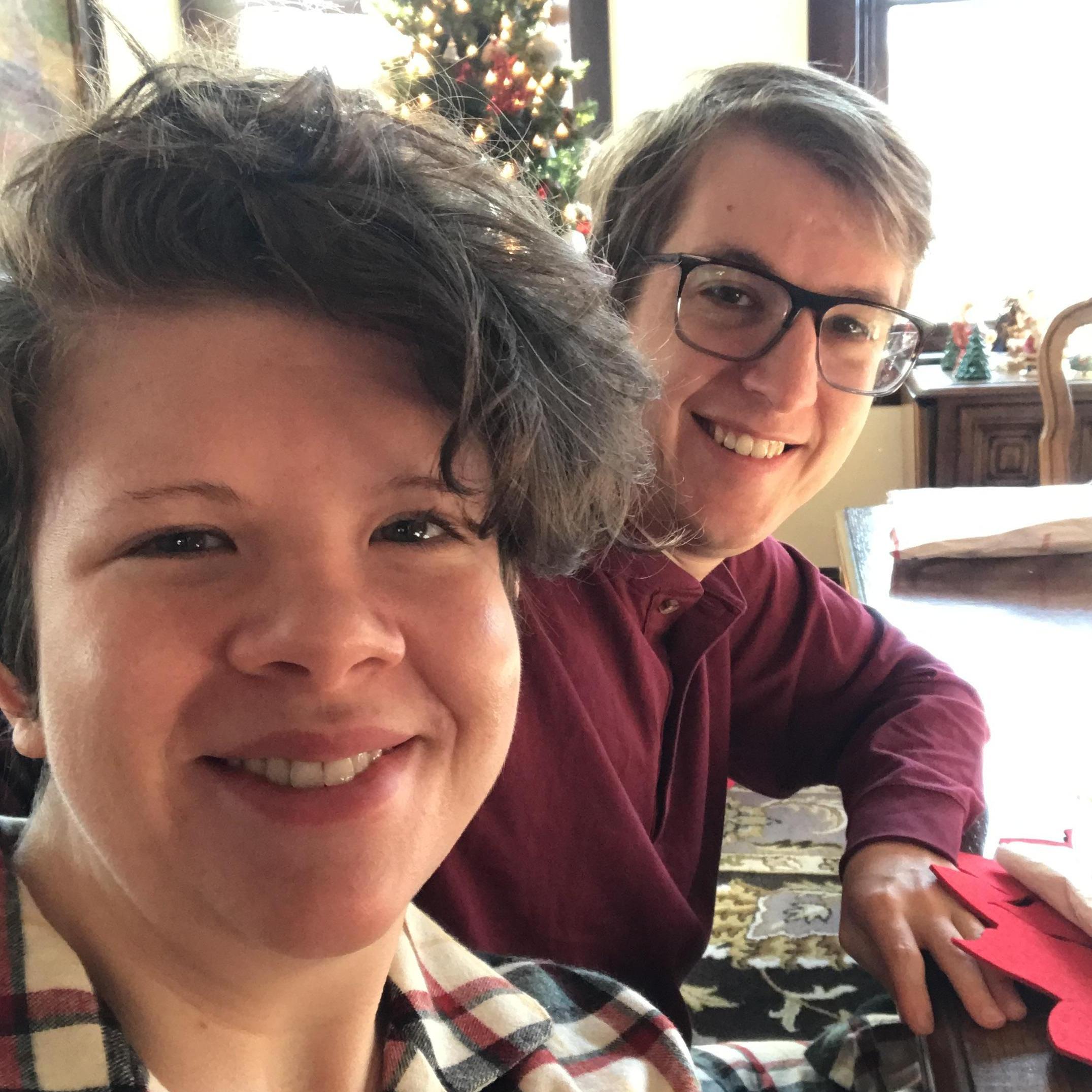 Sarah and Jacob in matching PJs on Christmas morning