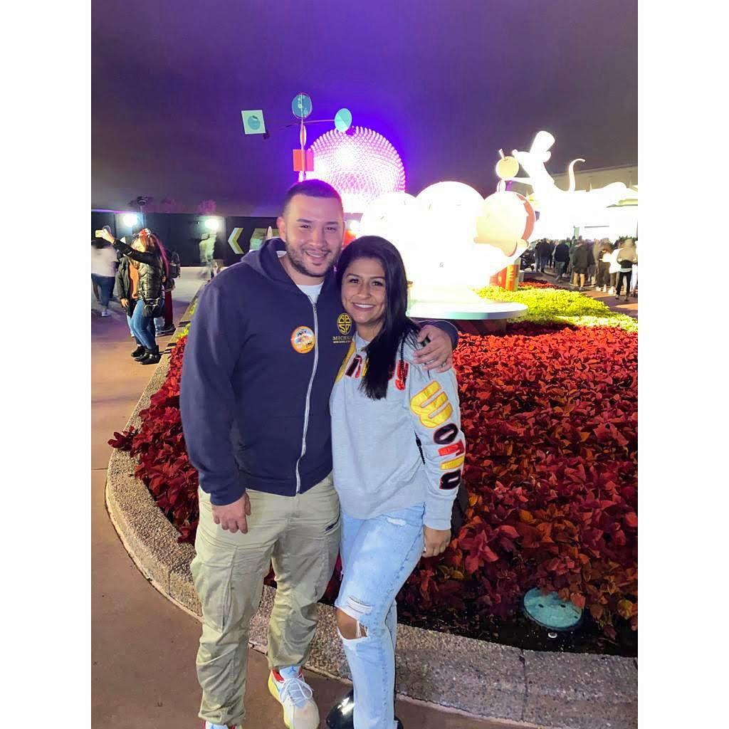Elliott and Jennifer together in Disney World 5 months after they first met.
