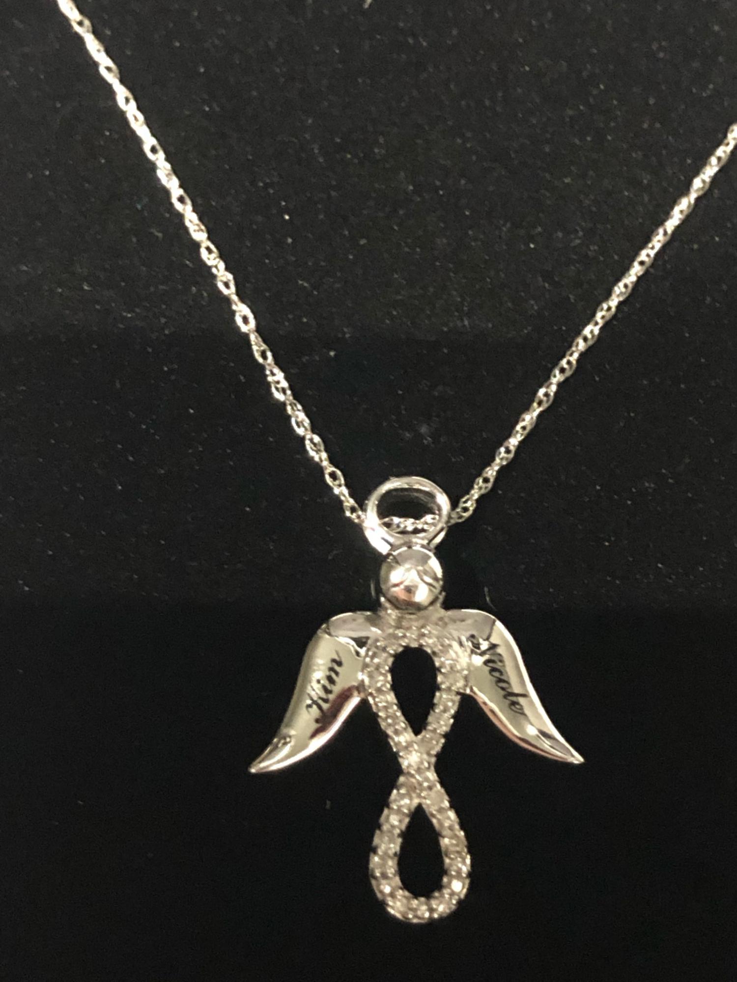 First gift Travis brought Isha. A diamond necklace with an angel and on each wing his mom name and her mom. Kim & Nicole.