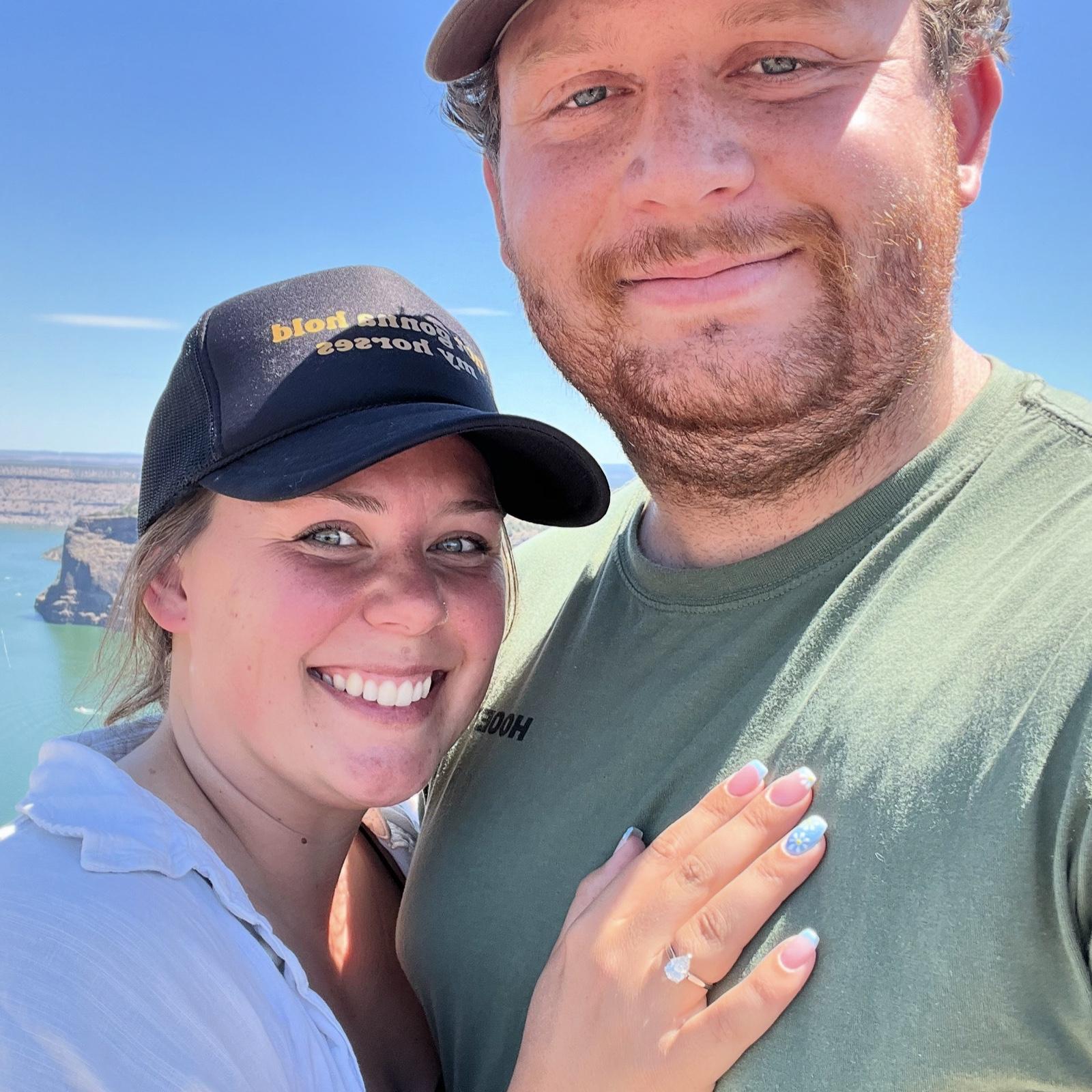 Our engagement!!! Case proposed on the look out point above lake Billy Chinook, after they spent the day down by the water.
