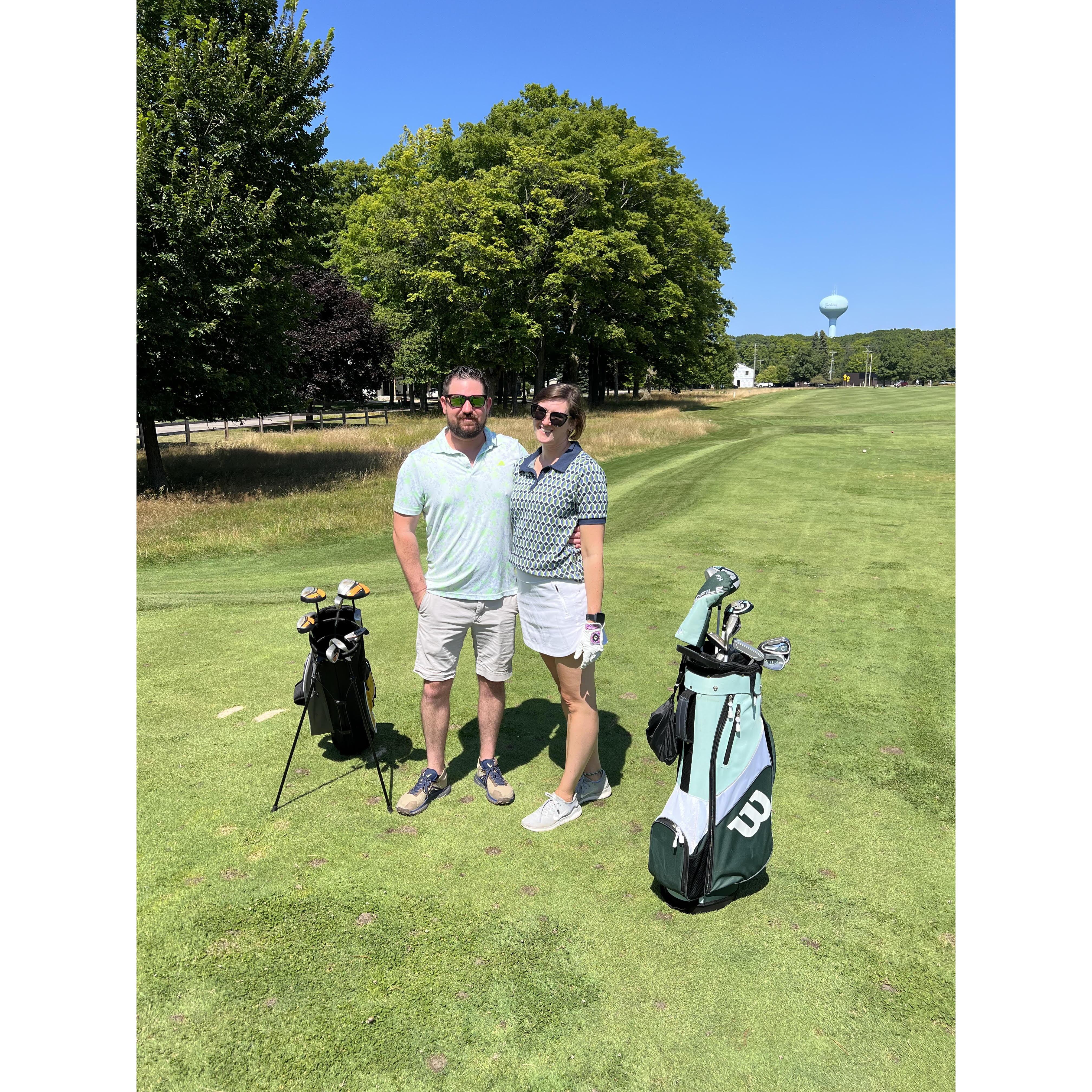 Golfing in Charlevoix MI. Our outfits are better than our golf game